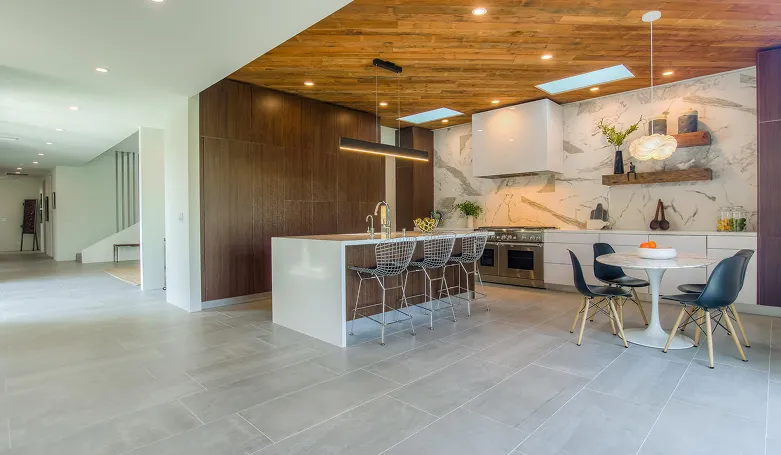 Wall-mounted storage and cabinetry in a remodeled bathroom