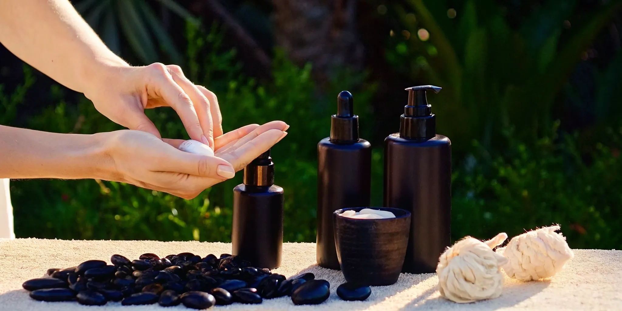 Hands applying cream during an elevated daily skincare ritual