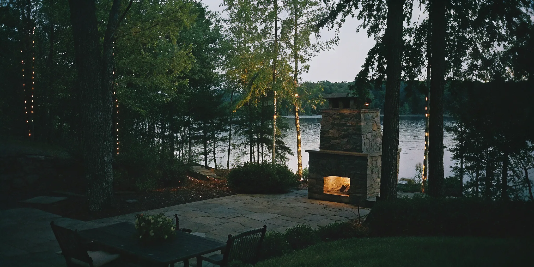 Custom stone outdoor fireplace on a Lake Norman waterfront patio