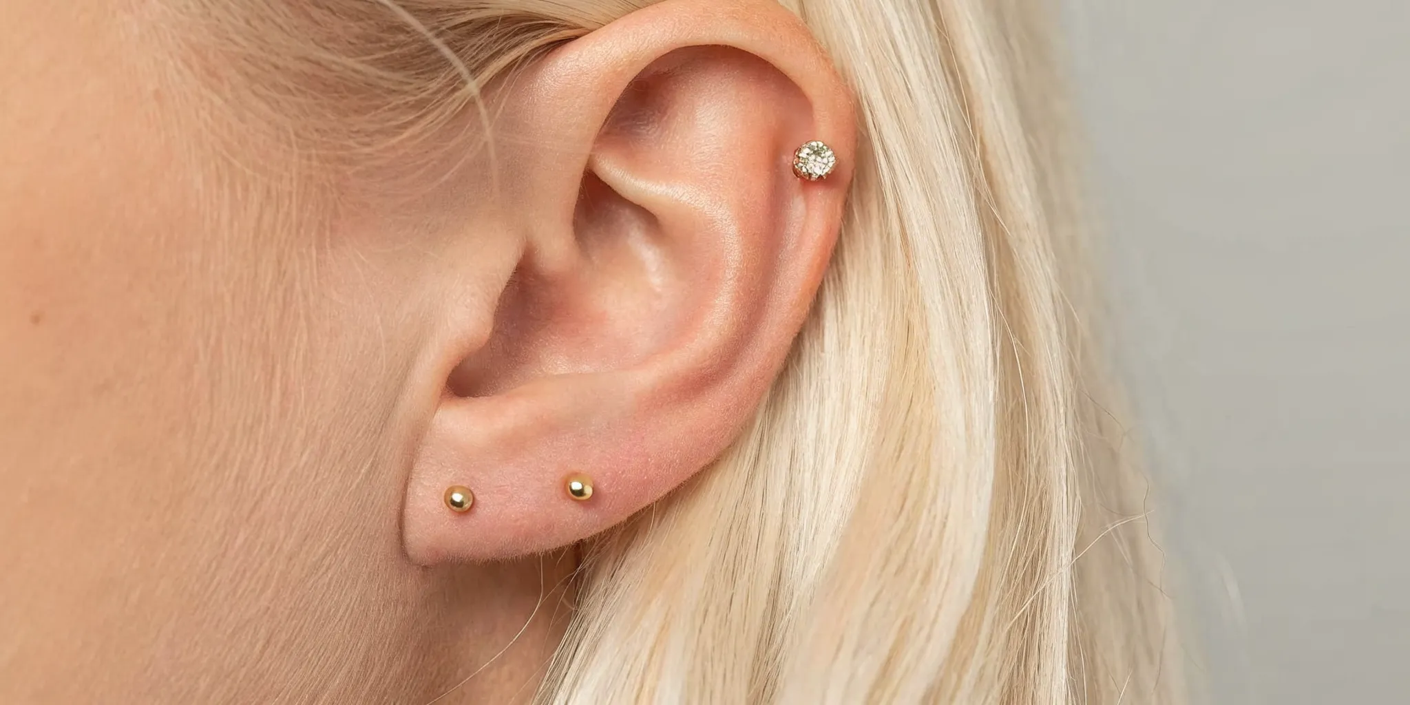 Curated ear jewelry featured in the Z Edge ear piercing chart guide