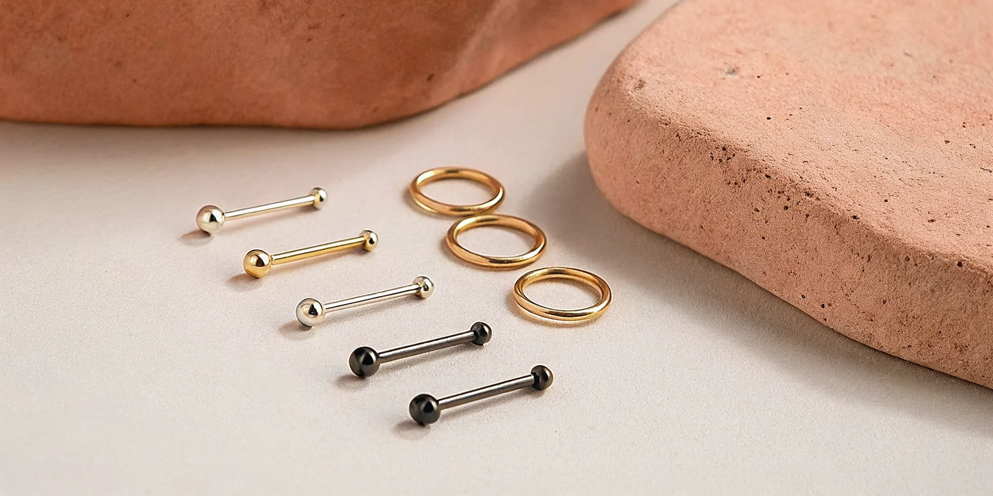 Nose piercing jewelry styles including studs and hoops