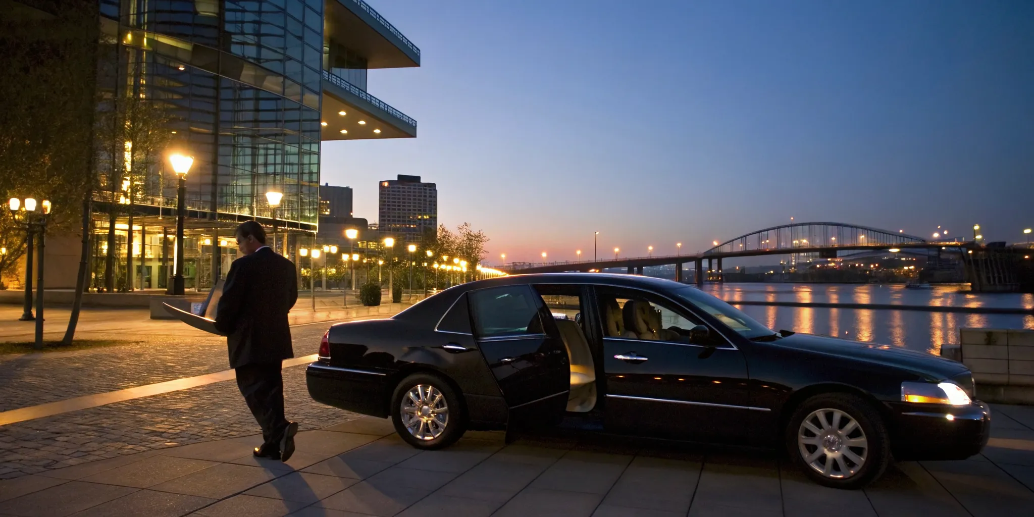 A professional chauffeur for a black car service in Wilmington.