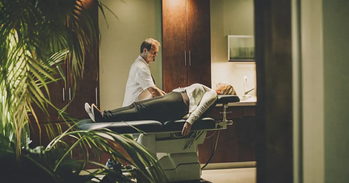DRX9000 spinal decompression table in a professional Chicago clinic treatment room