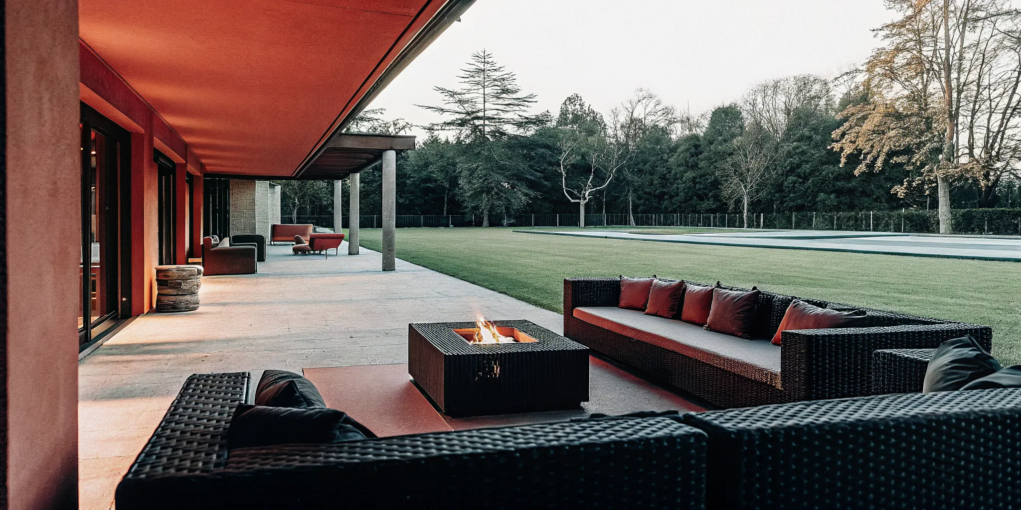 Executives in a structured strategy conversation at a private estate