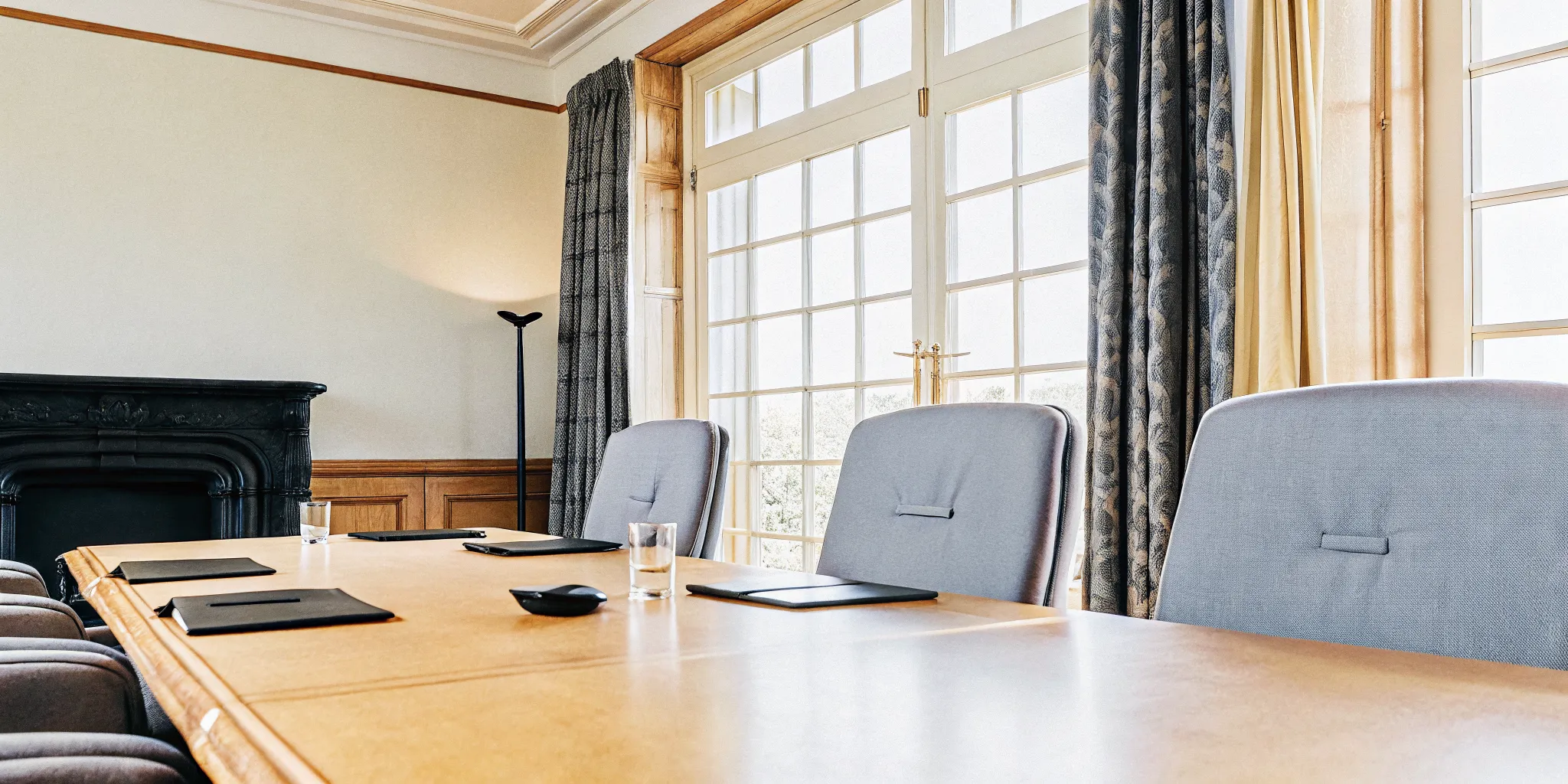 A luxury corporate retreat meeting room at The Charles Chateau private membership estate