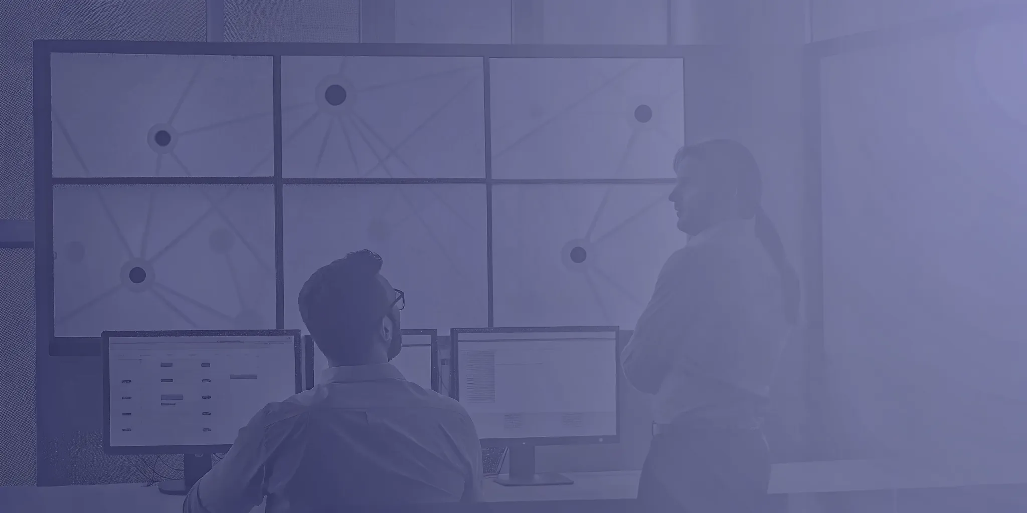 Platform engineers reviewing workload identity configuration for Kubernetes clusters in a modern operations room