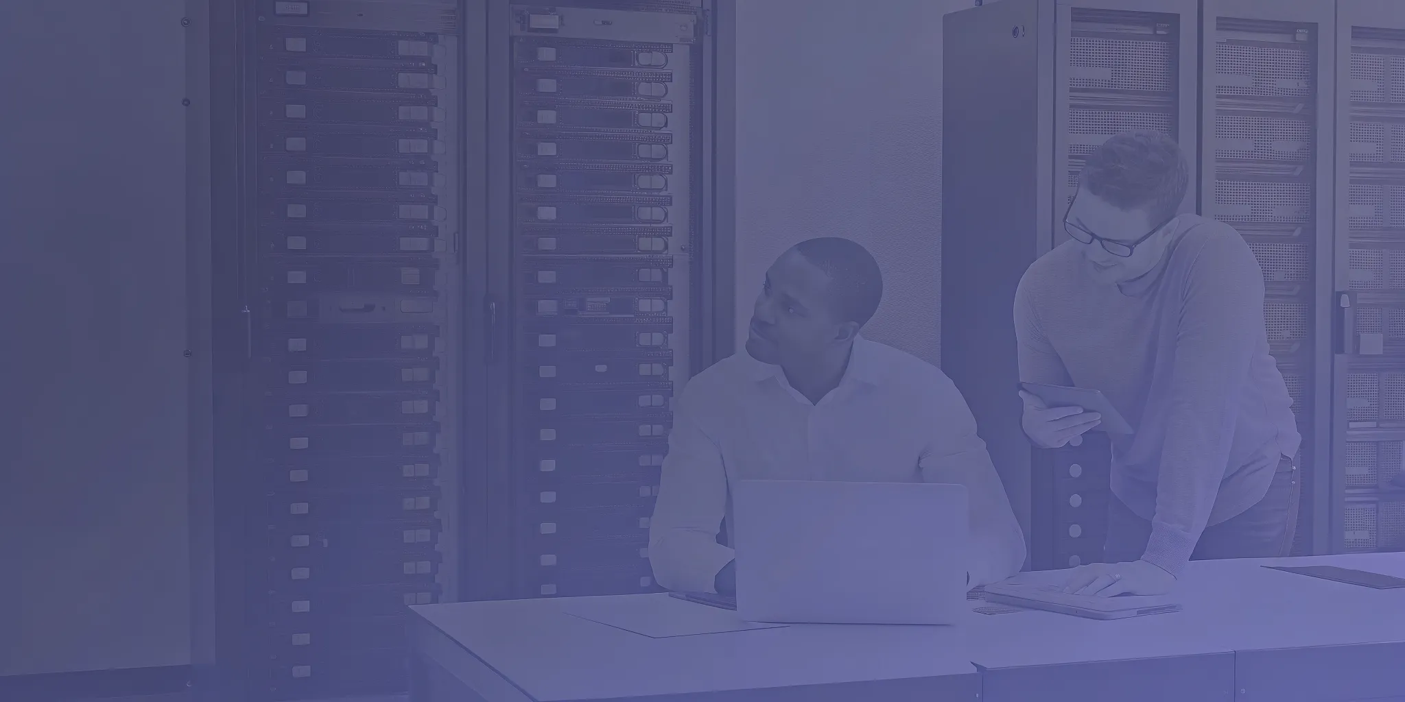 FinOps and platform engineers reviewing cloud infrastructure and cluster cost allocation in a server room