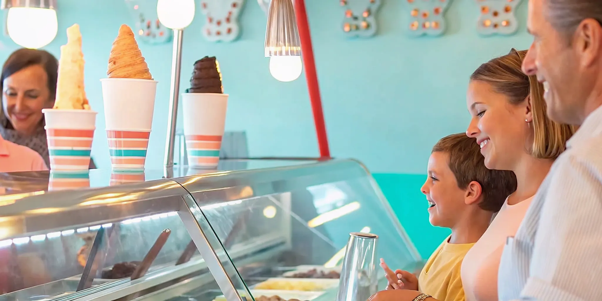 A family choosing scoops of small-batch ice cream at a vintage soda fountain counter