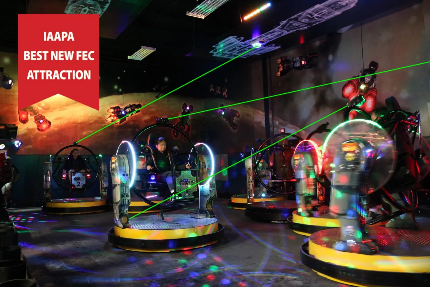 Two players facing off in LazerFury 360 laser-combat arena gameplay