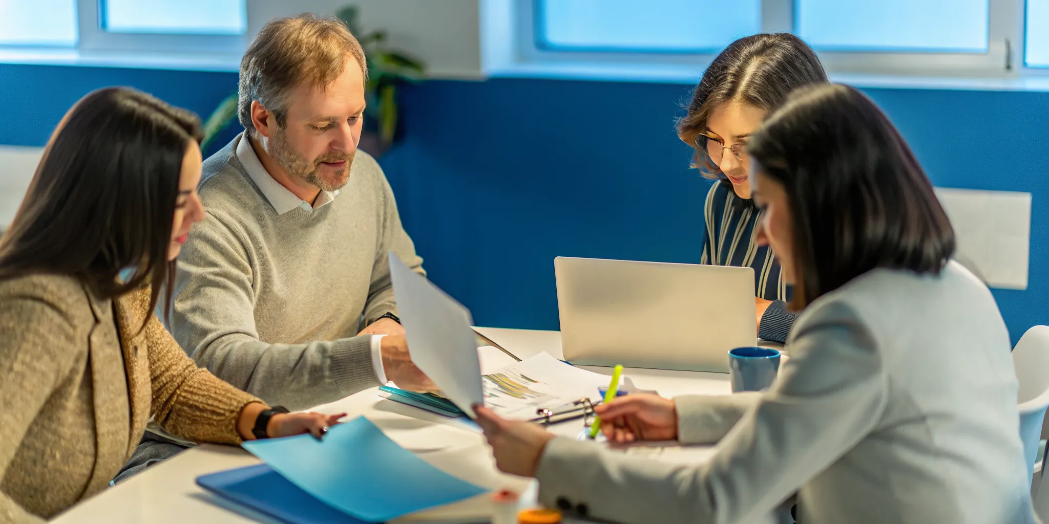 Education professionals conducting a Cognia accreditation quality review