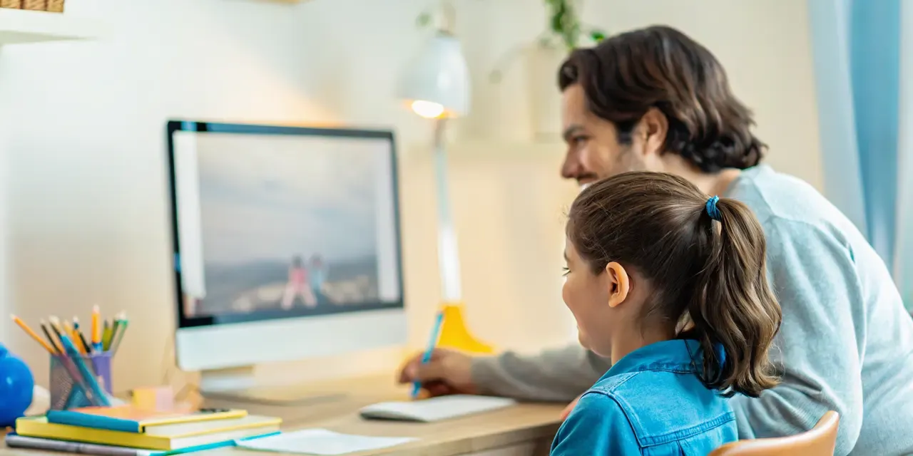 Student attending live online school with parent support