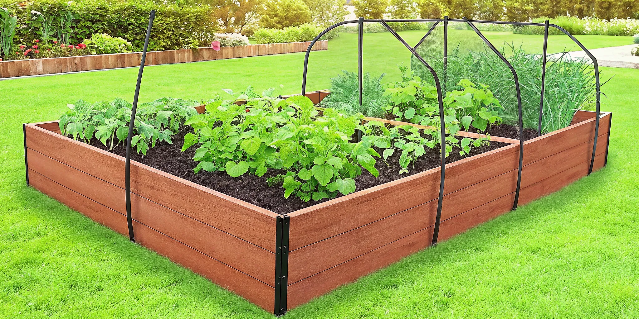 Modular raised vegetable garden protected by an animal barrier and row cover