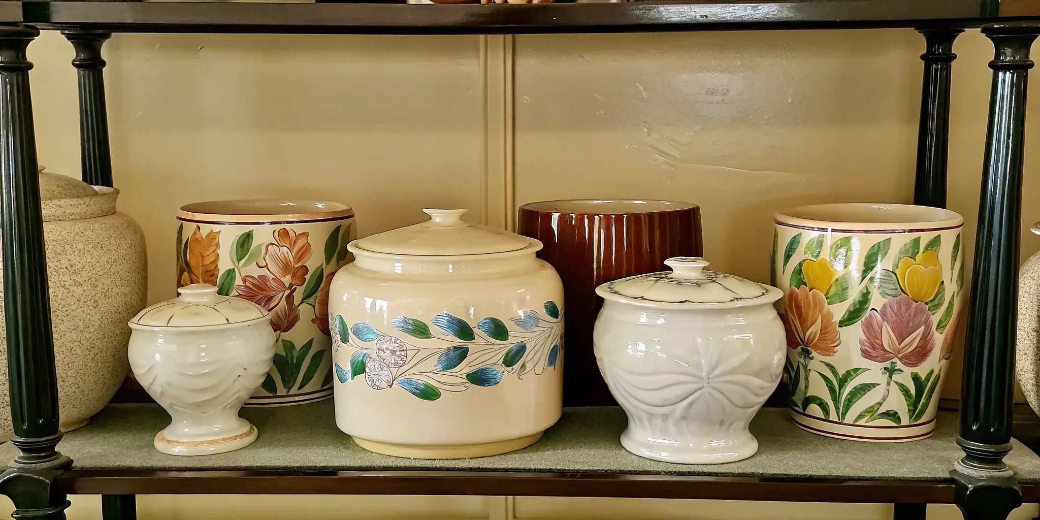 Vintage McCoy pottery cookie jars and colorful vases