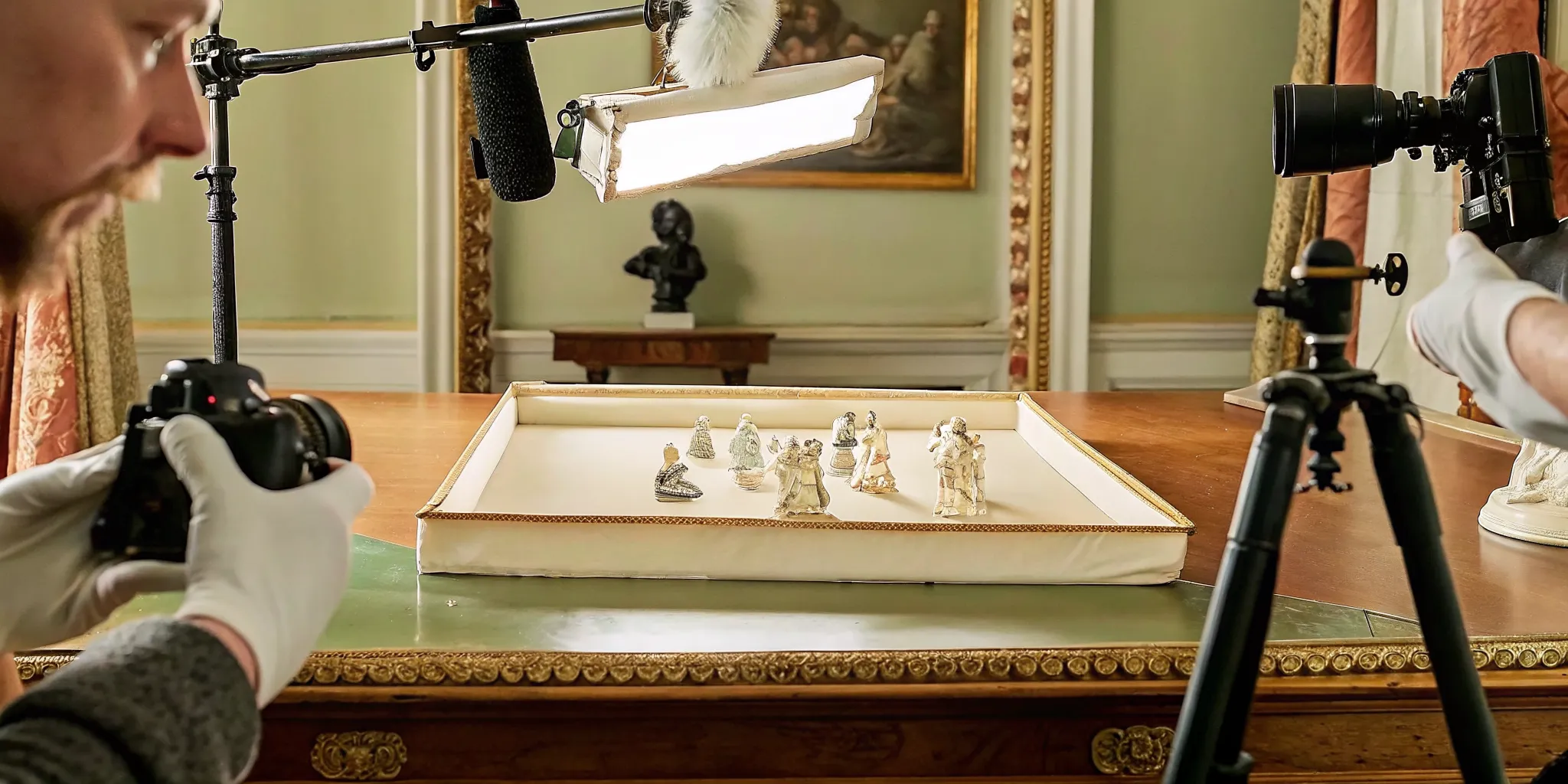 Royal Copenhagen porcelain figurines arranged for condition inspection