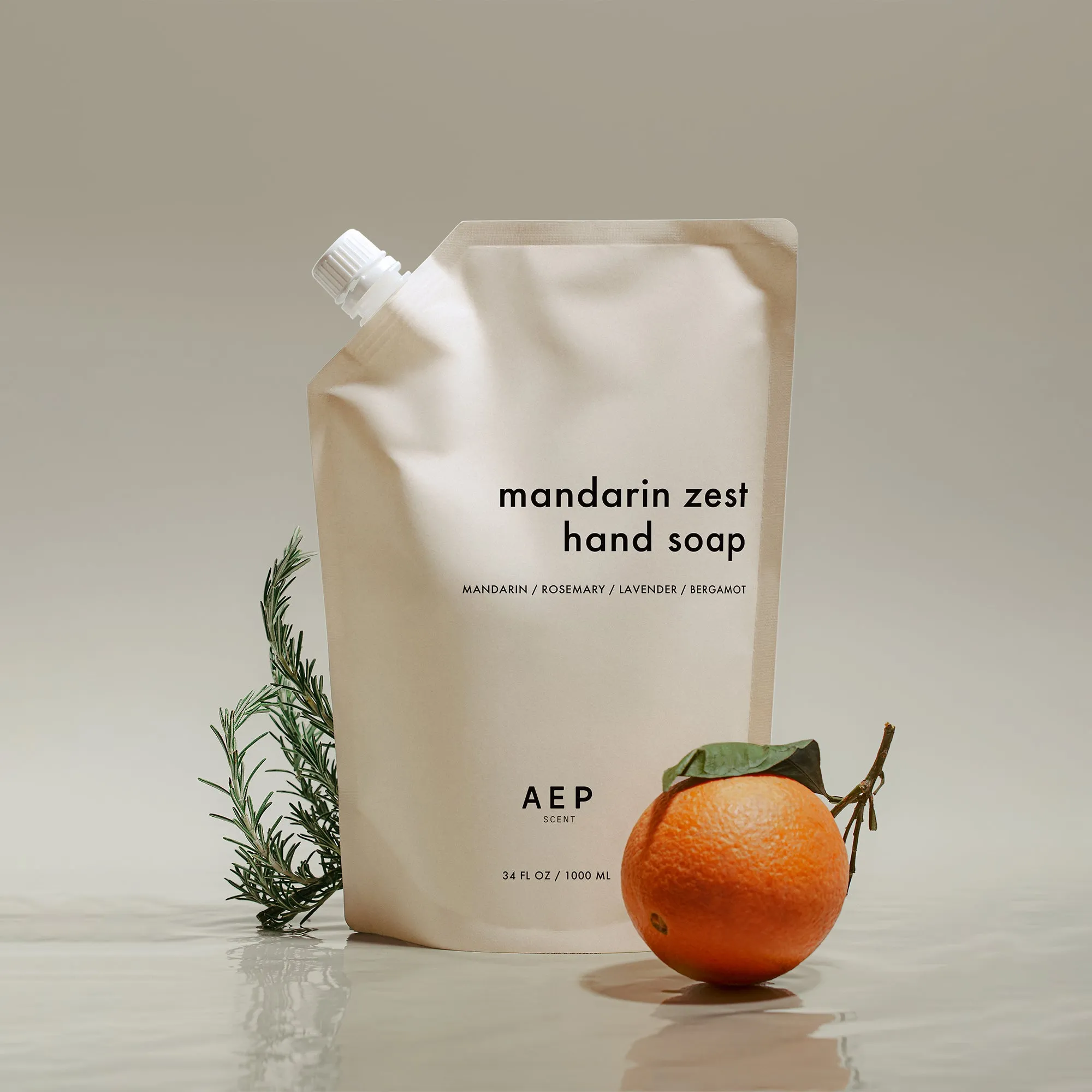 Mandarin bergamot hand soap refill from AEP Scent in a clean, minimal powder room setting