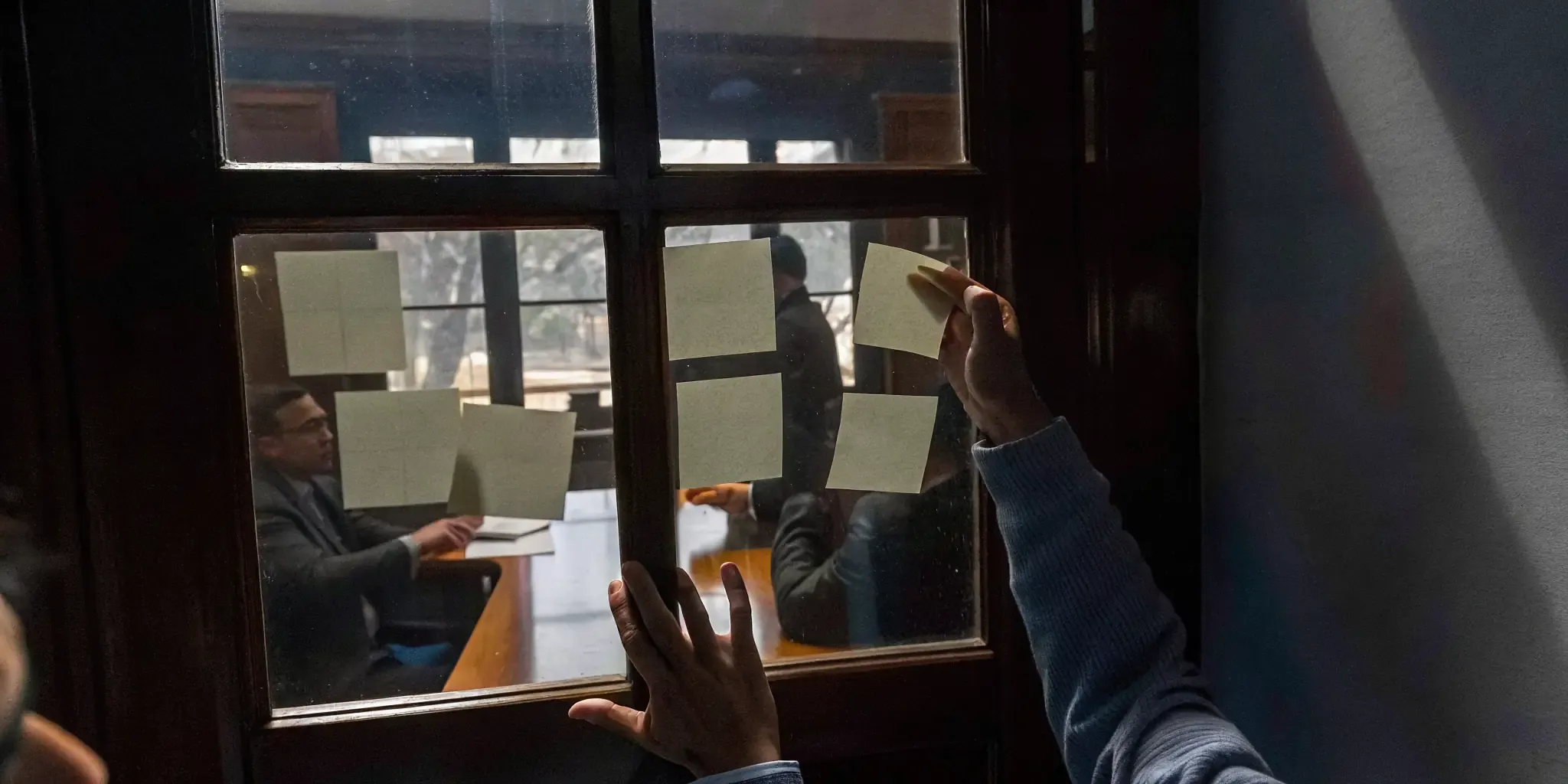 Business leaders turning debrief questions into owned actions