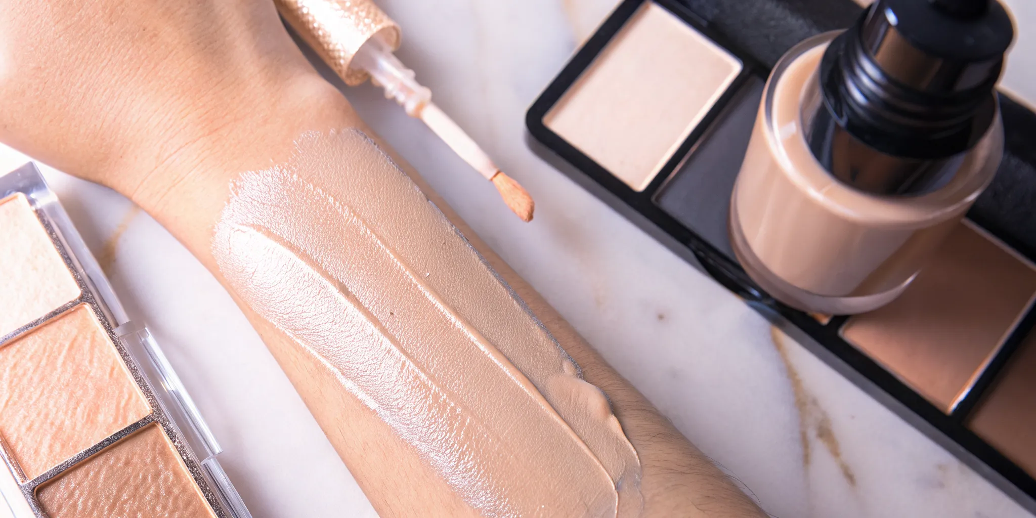 Luxury hydrating cream makeup being swatched on clean skin