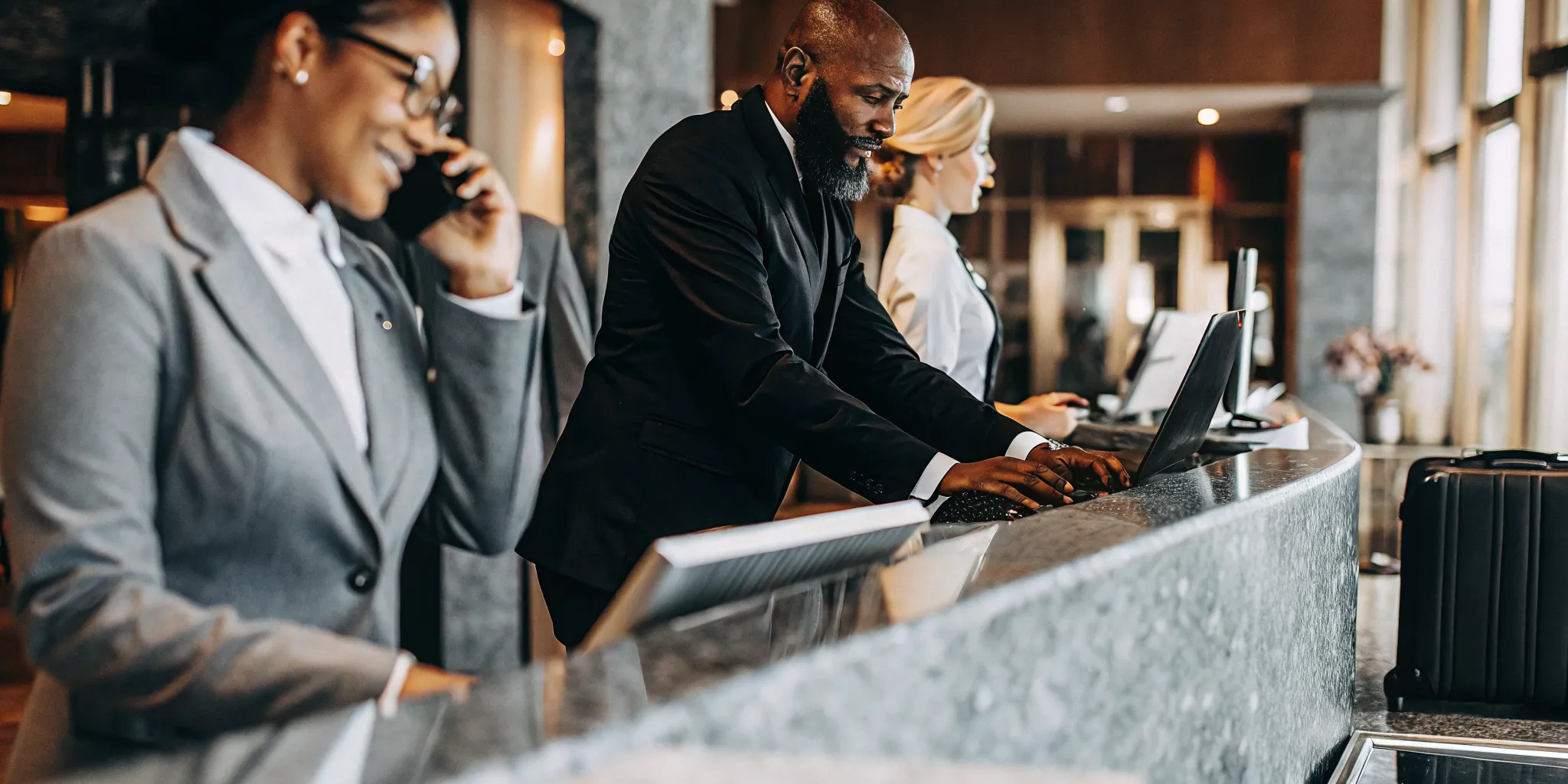 Luxury hotel operations team coordinating hotel call routing across departments