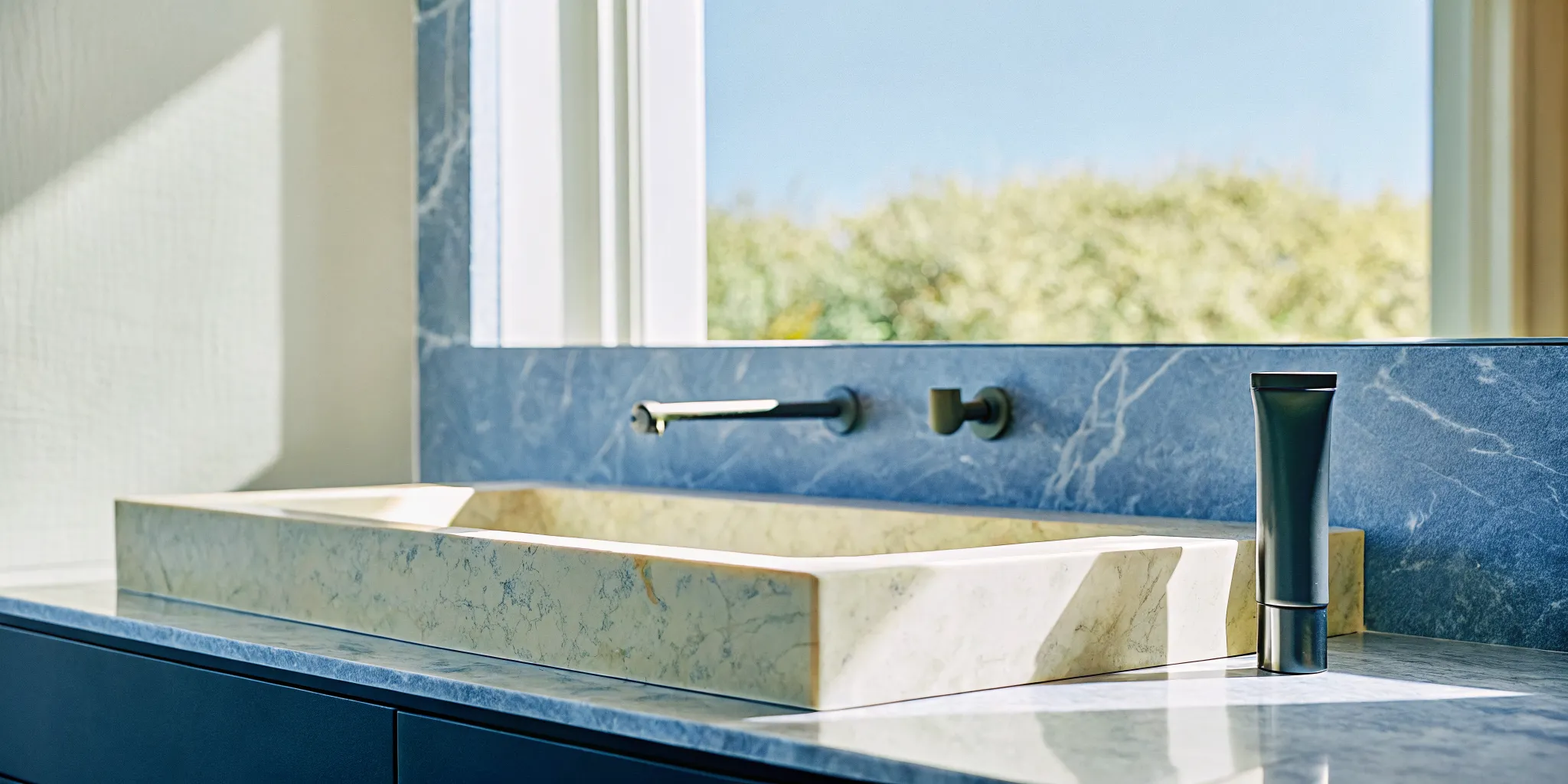 Premium hair care product on a clean marble bathroom counter with soft natural lighting