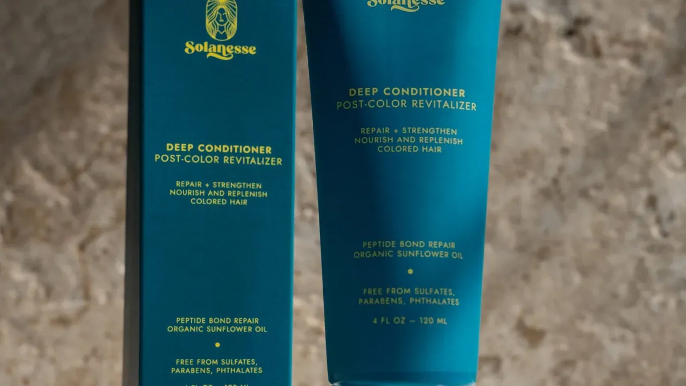 Solanesse Deep Conditioner beside its box for post-color conditioning care