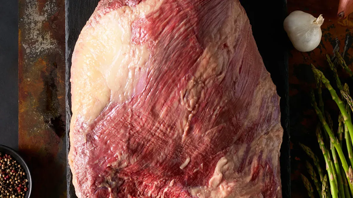Brisket prepared for a long, slow beef cooking method