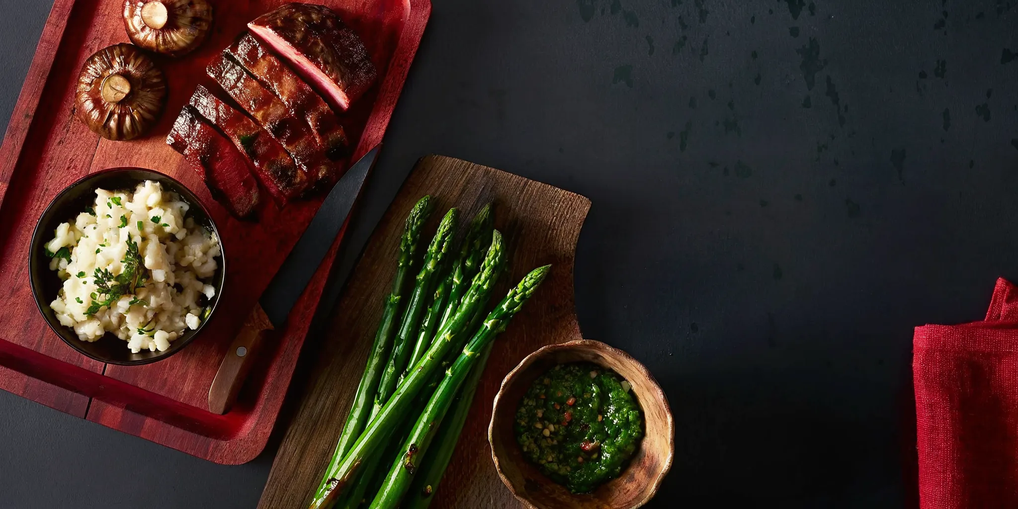 Roasted mushrooms, grilled asparagus, and truffle mashed potatoes with chimichurri served as wagyu steak sides