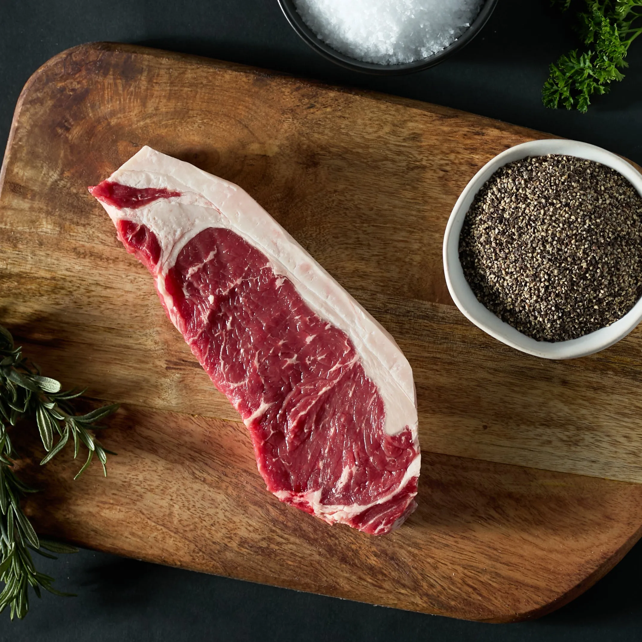 Real Slickhorn Ranch dry-aged New York strip steak before cooking