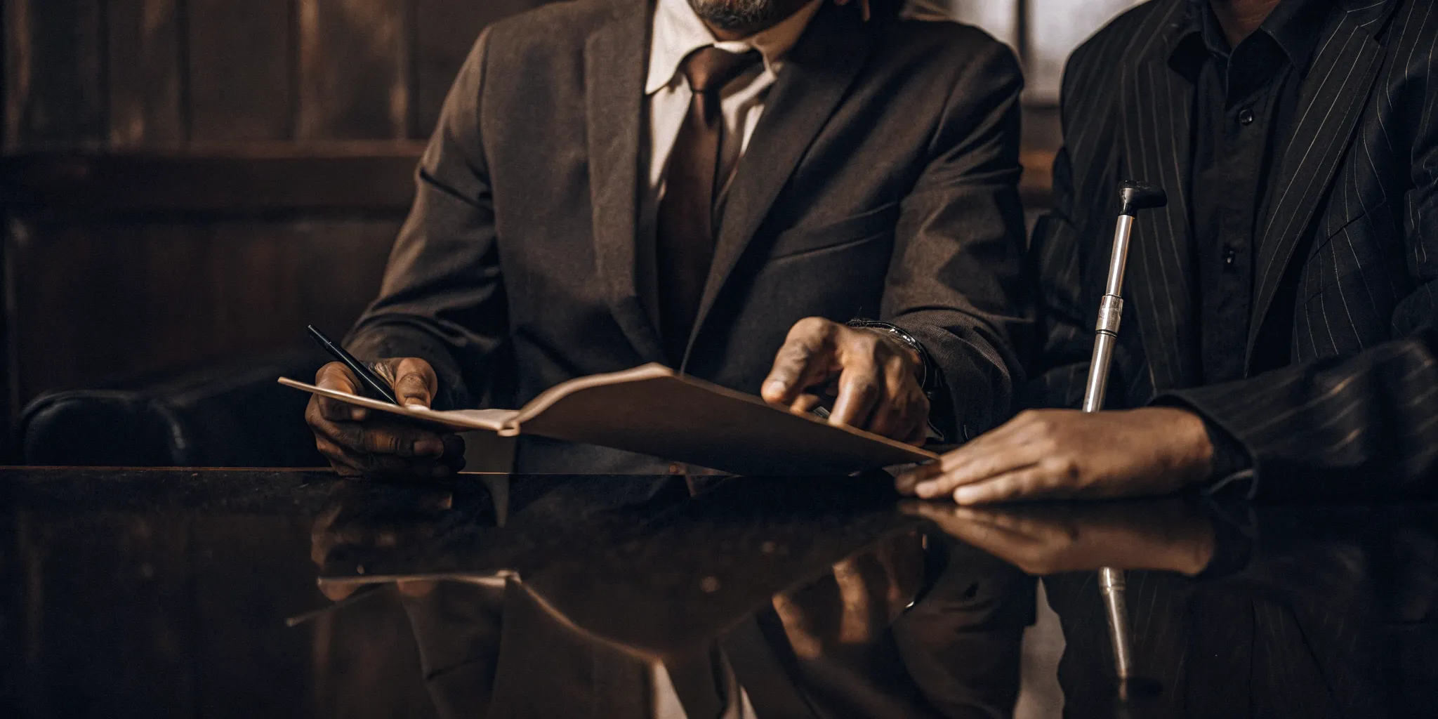 Attorney reviewing insurance evidence with an injured South Carolina client