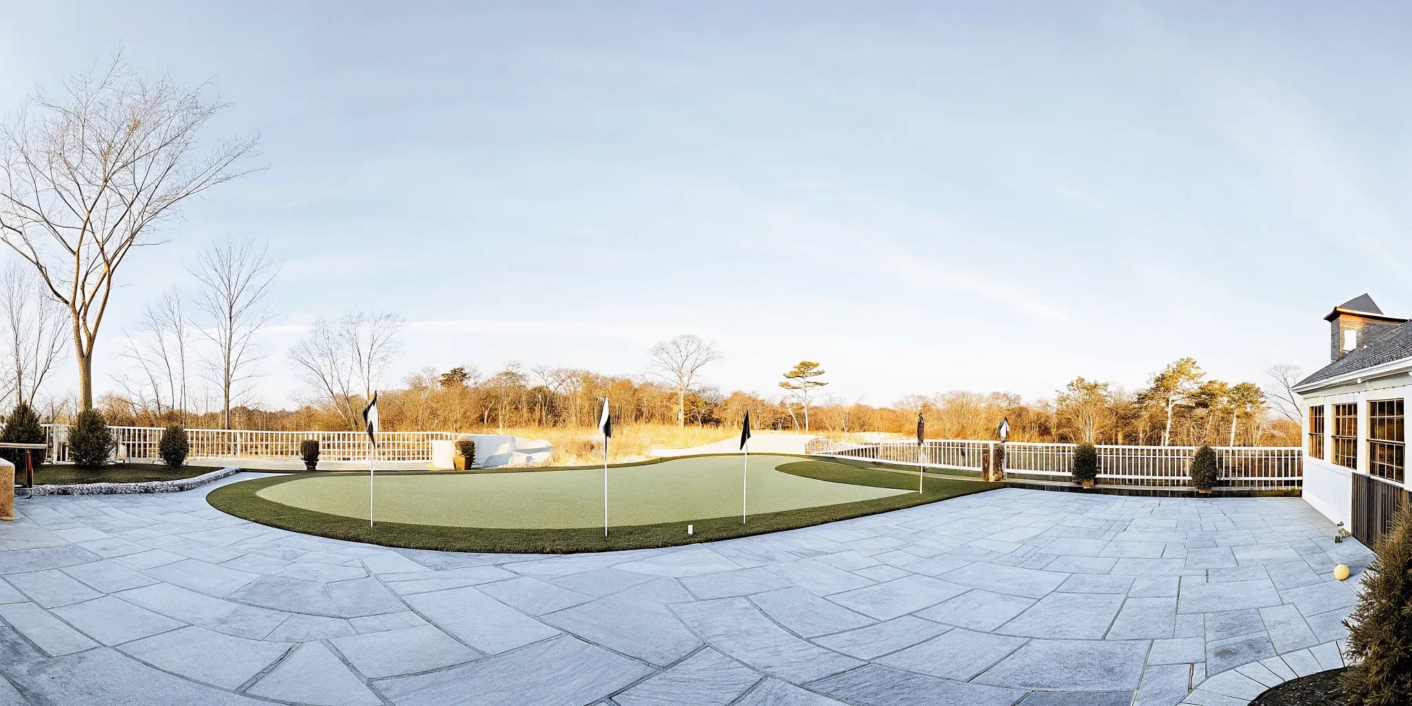 Custom backyard putting green at a Long Island home