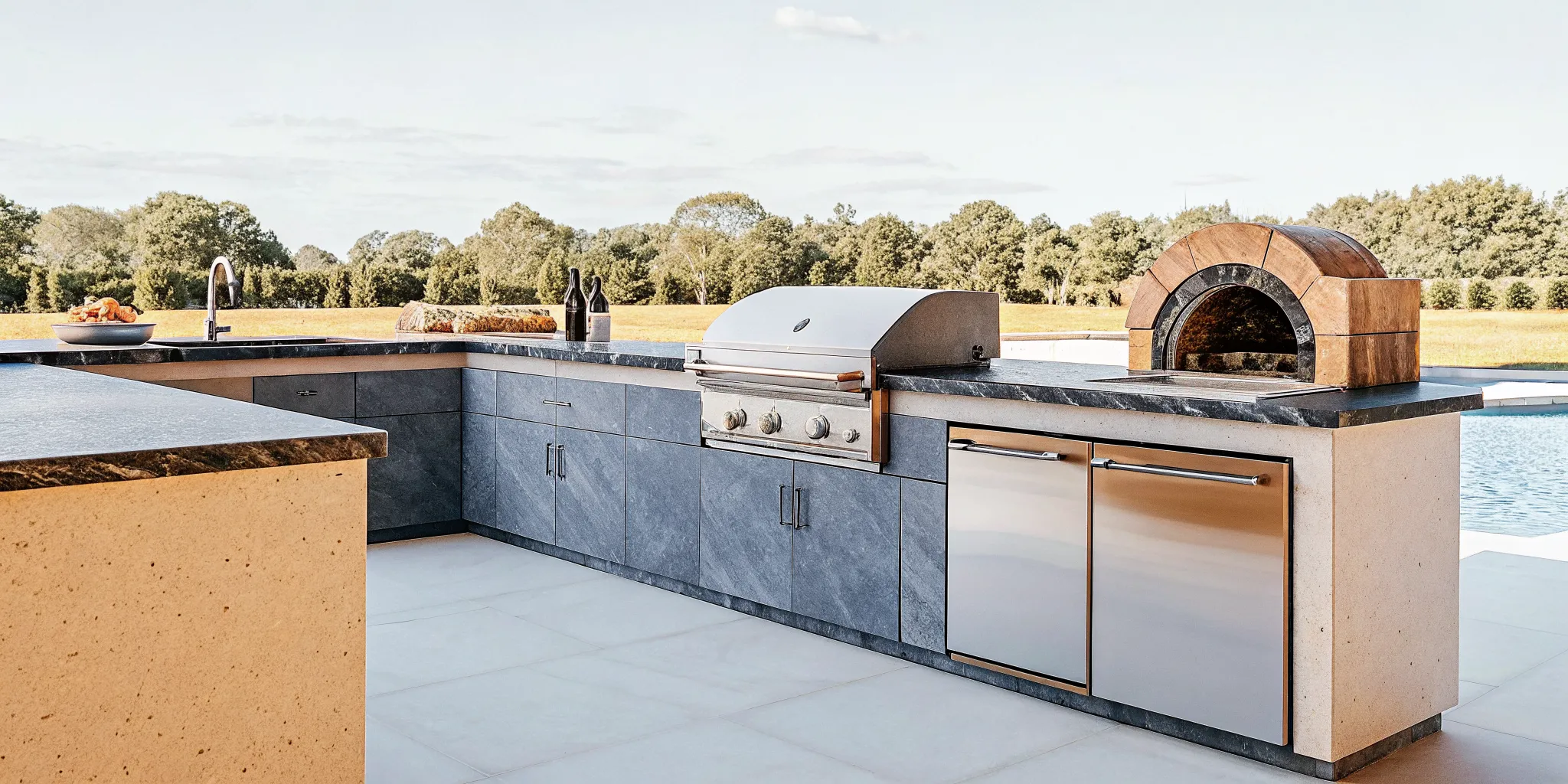 Built-in outdoor kitchen appliances in a Long Island entertaining space