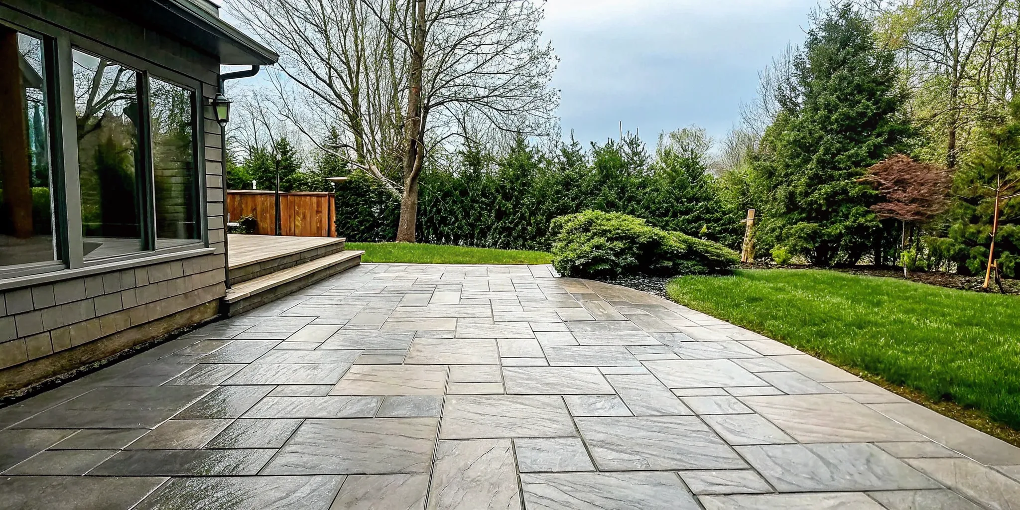 Long Island paver patio showing post-winter joint sand wear