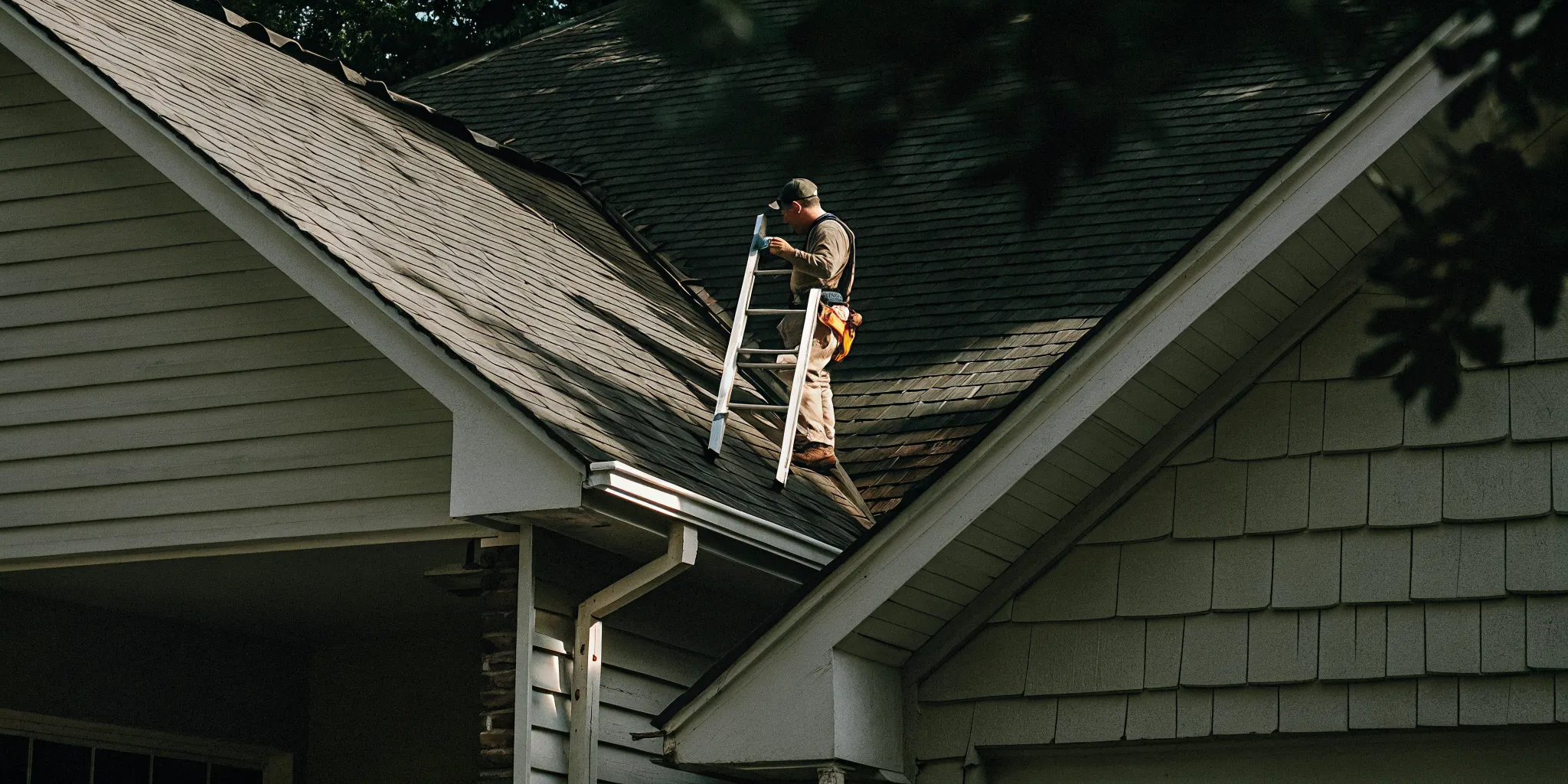 Professional completing a hurricane roof preparation checklist inspection on a Houston home