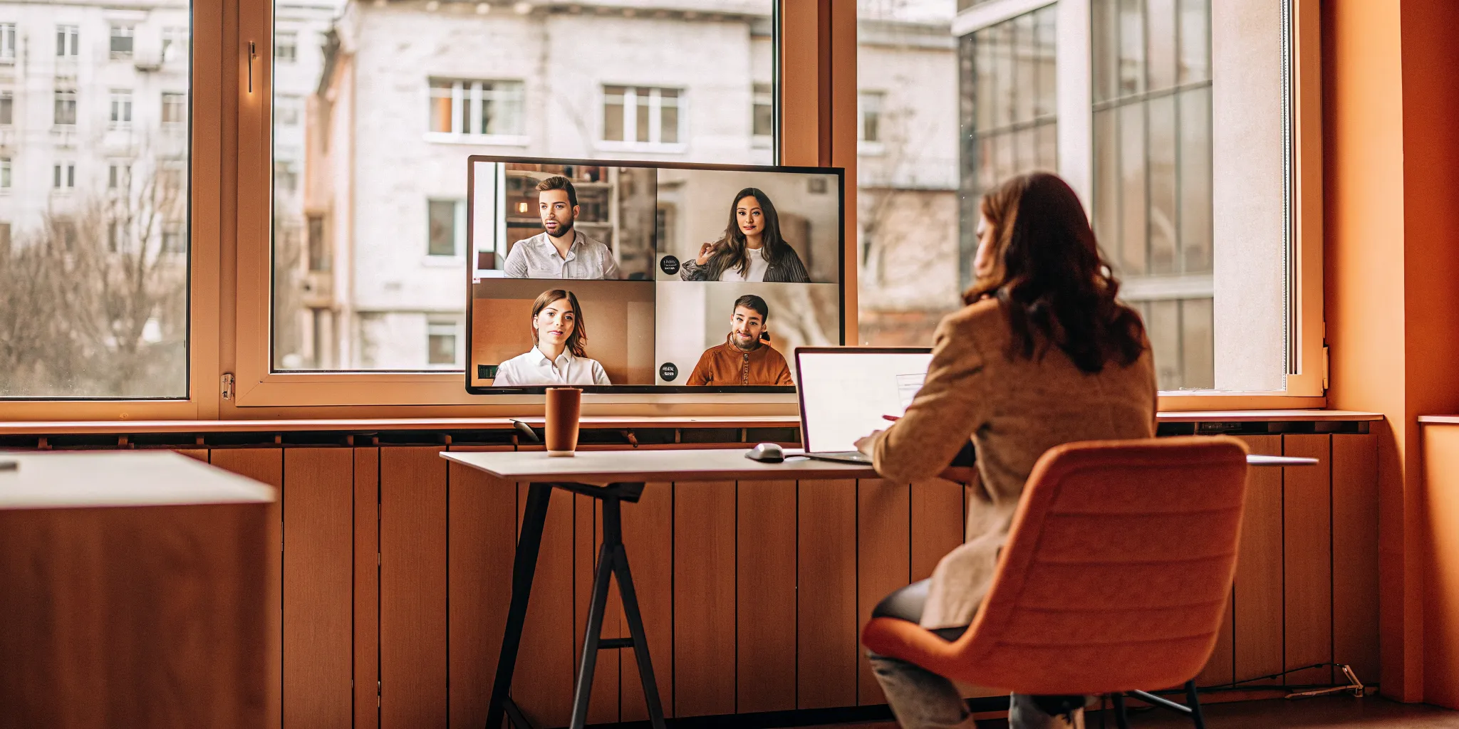 MSP operations manager reviewing outsourced business functions with a remote team MSP operations manager reviewing outsourced business functions with a remote team