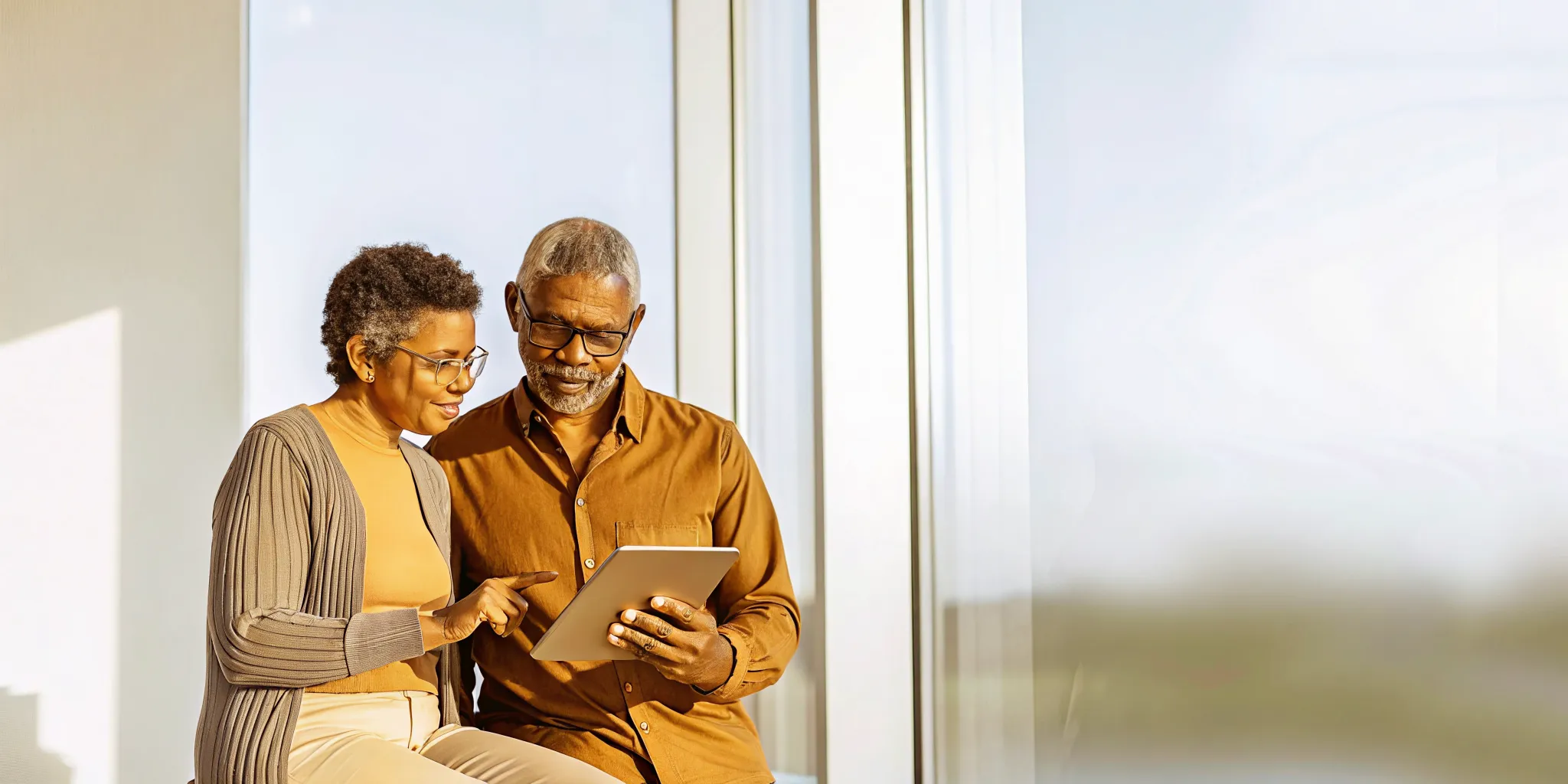 A financial planner and a small business owner reviewing SEP, SIMPLE, and Solo 401(k) options side by side as part of retirement planning for small business owners
