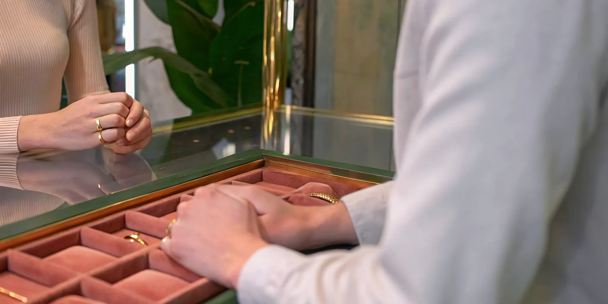Couple comparing contemporary engagement rings at the Element 79 boutique in Cherry Creek North