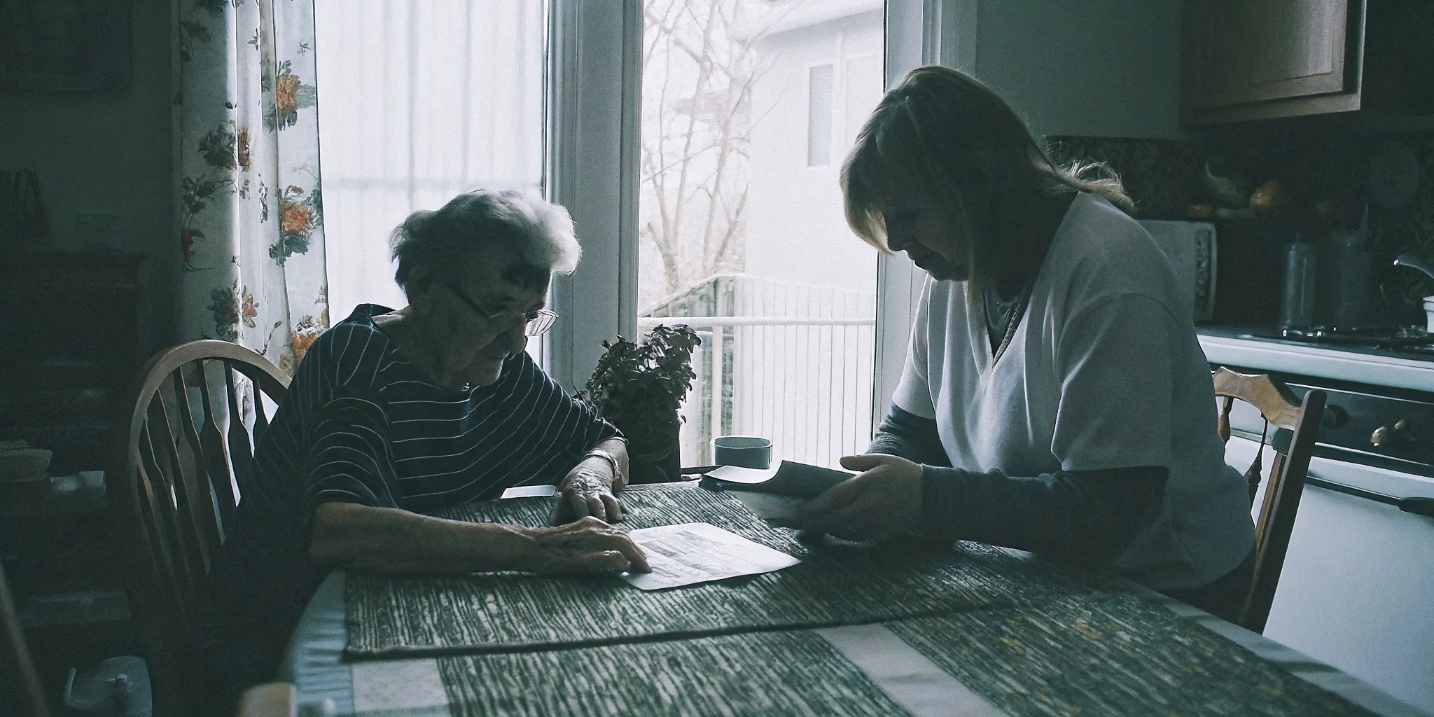 Older adult and caregiver reviewing a weekly non medical home care plan