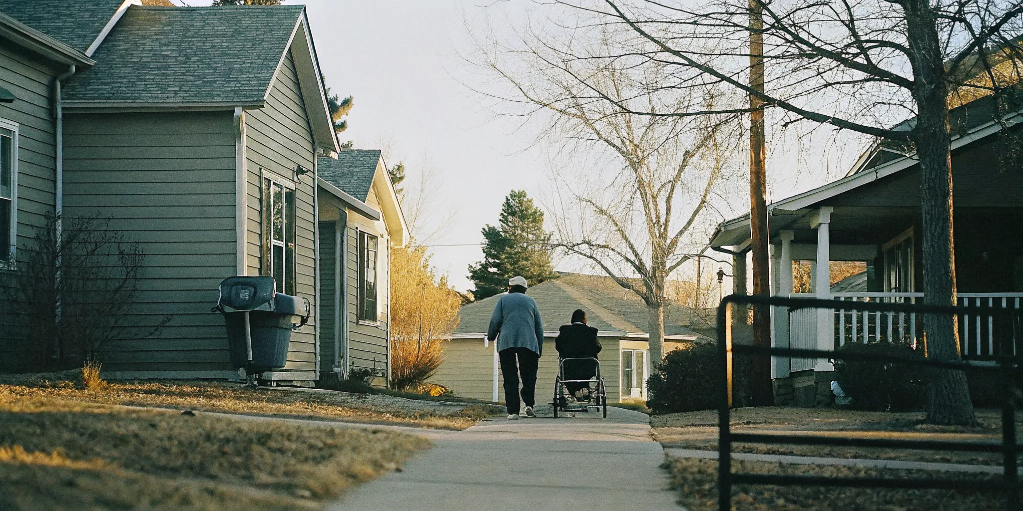 Older adult enjoying a walk with a companion caregiver in Aurora