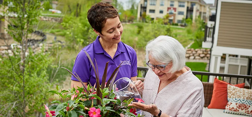 Aurora caregiver offering calm support for a senior with sundowning dementia