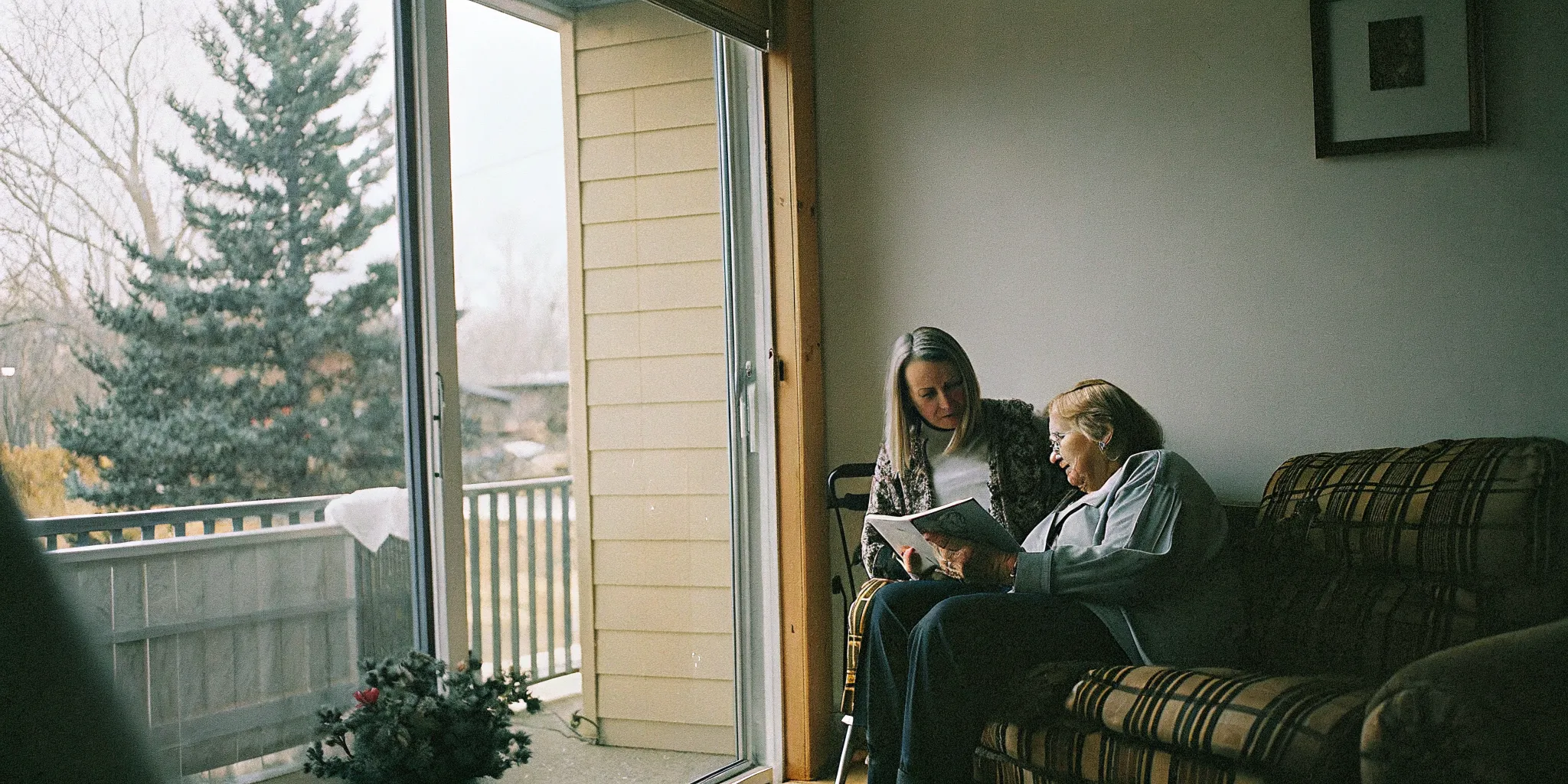 Daughter offering supportive in-home care to her older mother