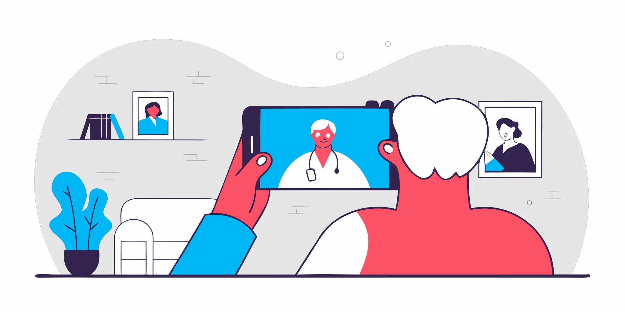 Senior patient having a video call with a doctor on a tablet in a comfortable living room