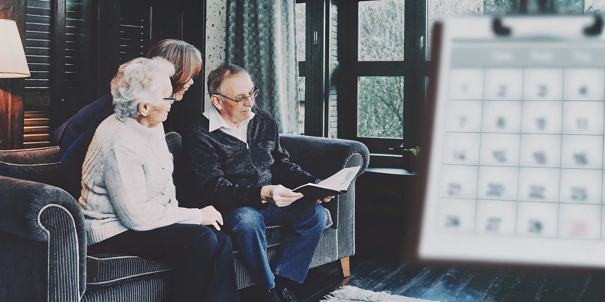 Senior couple reviewing Medicare Part B enrollment deadlines with a licensed insurance agent