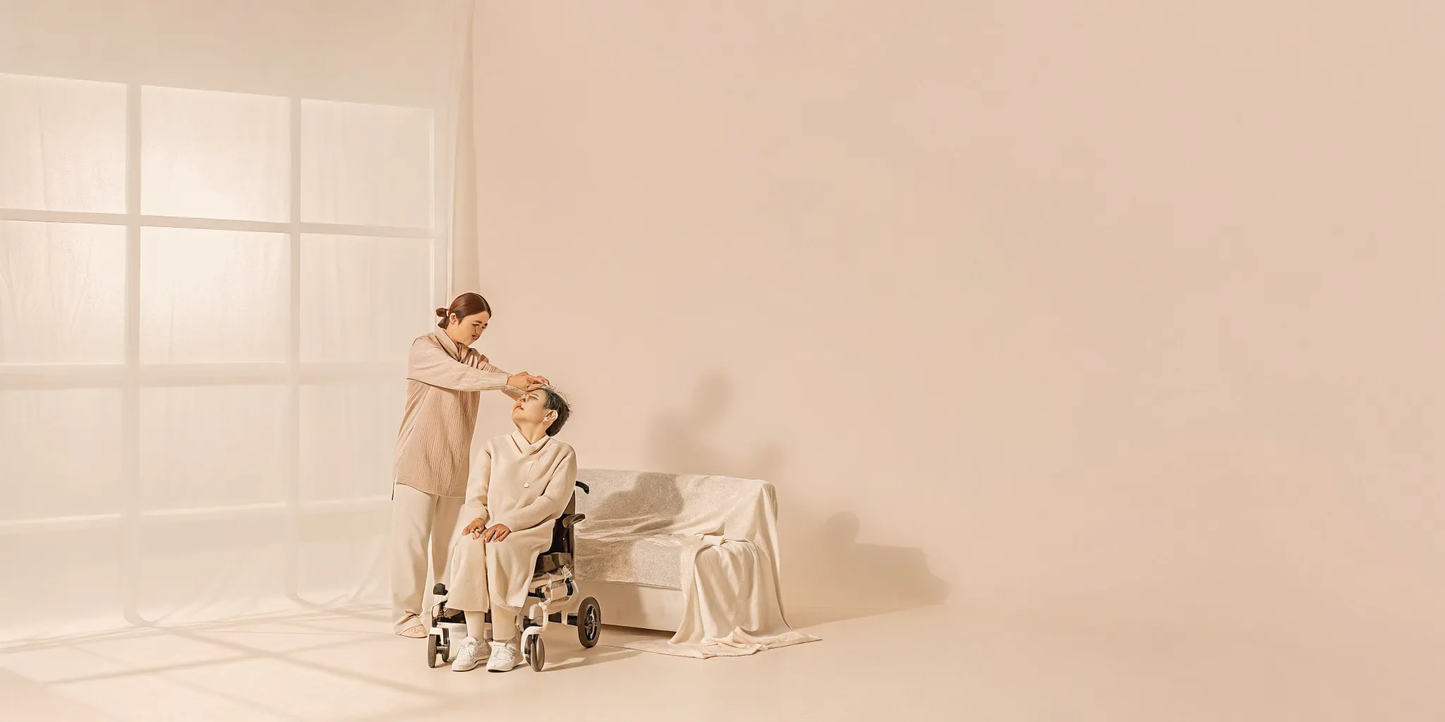 Rehabilitation therapist showing home accessibility modifications to a spinal cord injury patient