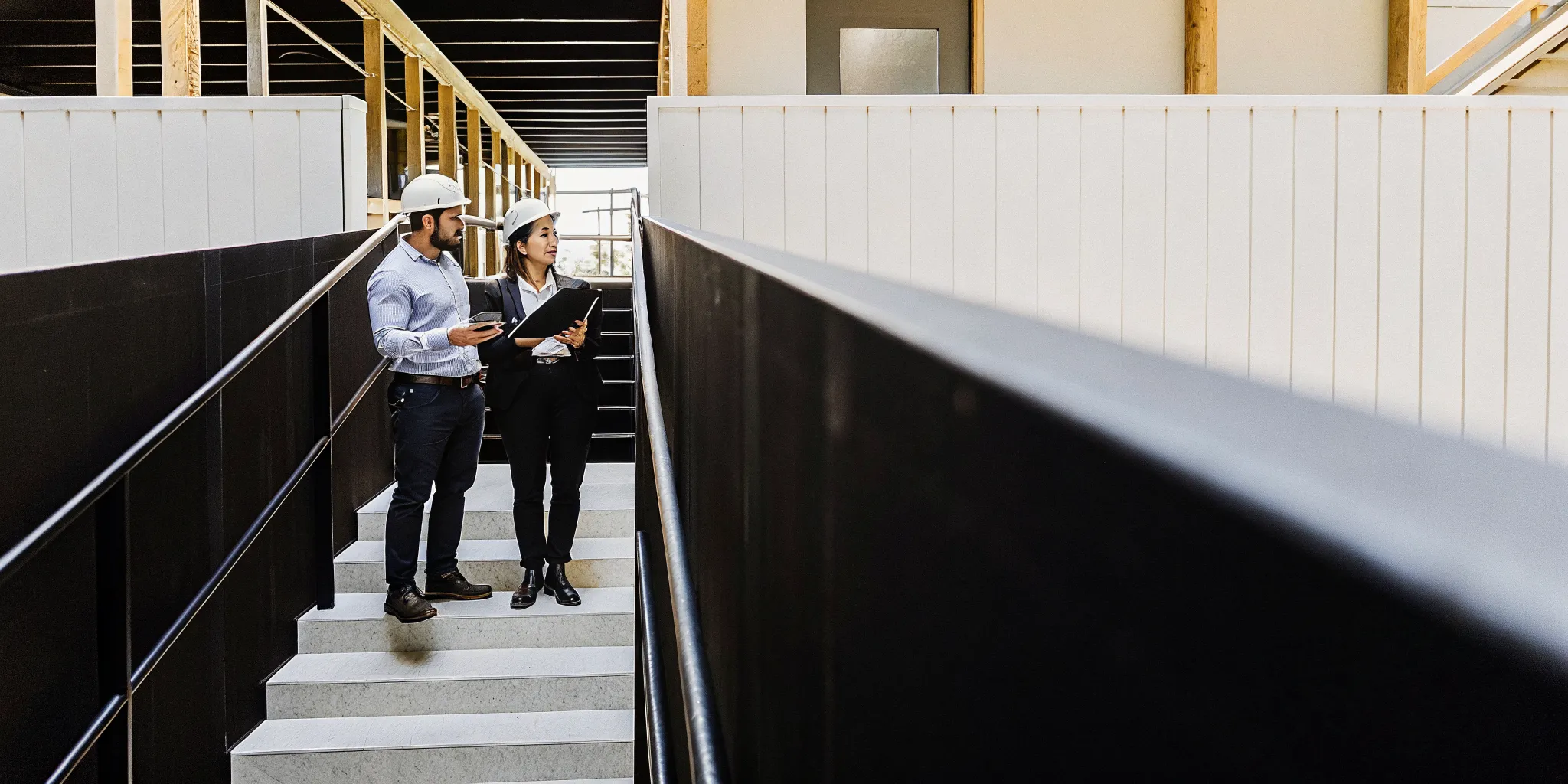 Advisor and CFO conducting a commercial property tax review at an industrial facility