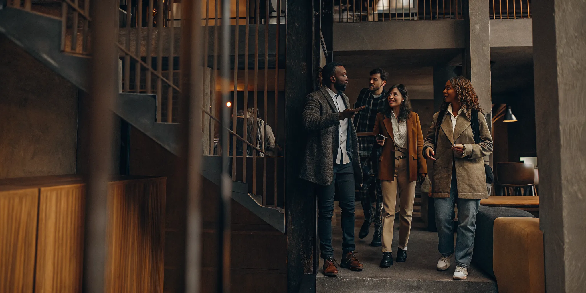 Parents and students discussing an off-campus apartment during a guided tour