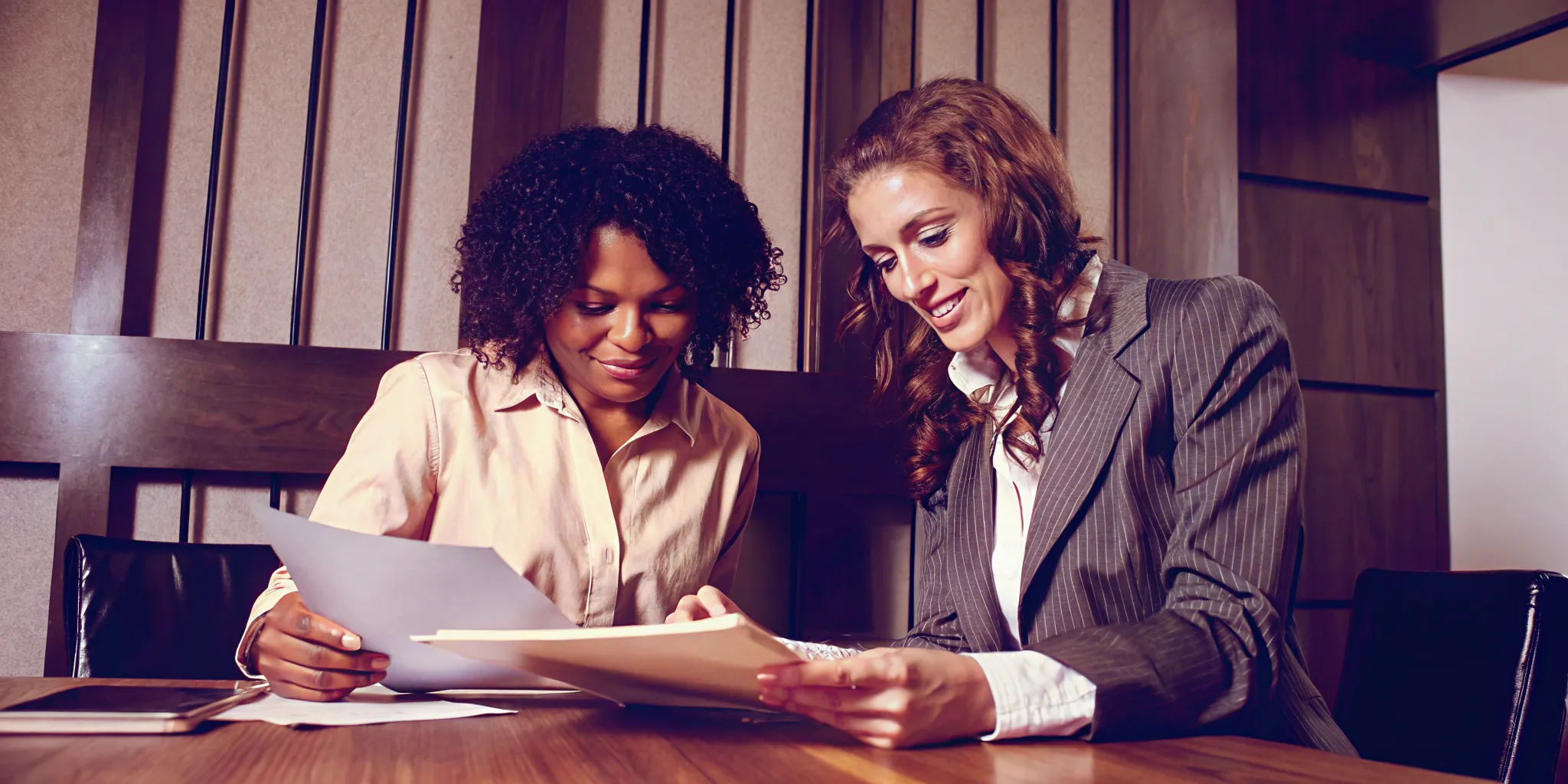 Attorney and client comparing ethical litigation funding models