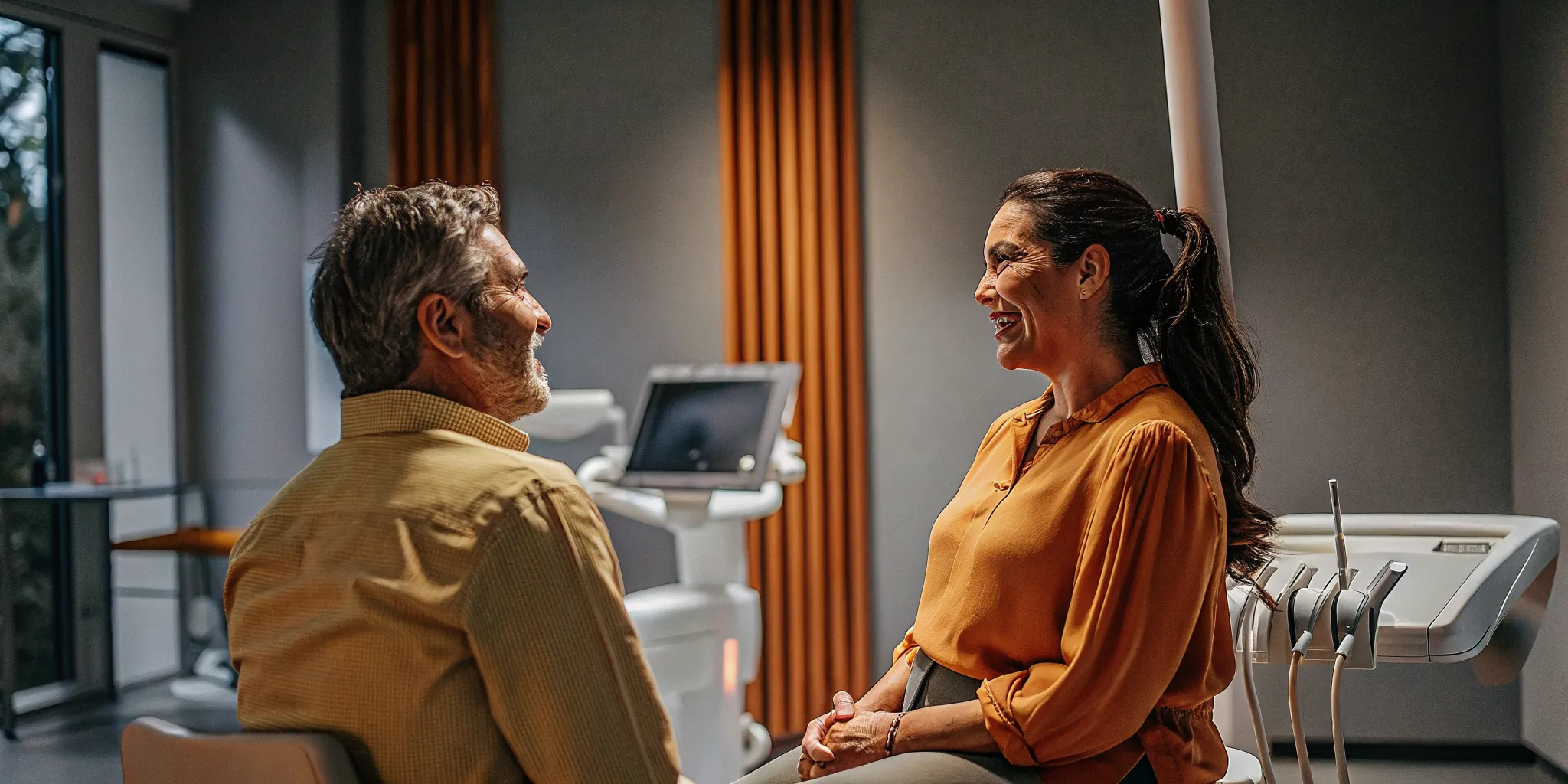 Dentist helping a patient learn how to calm dental anxiety