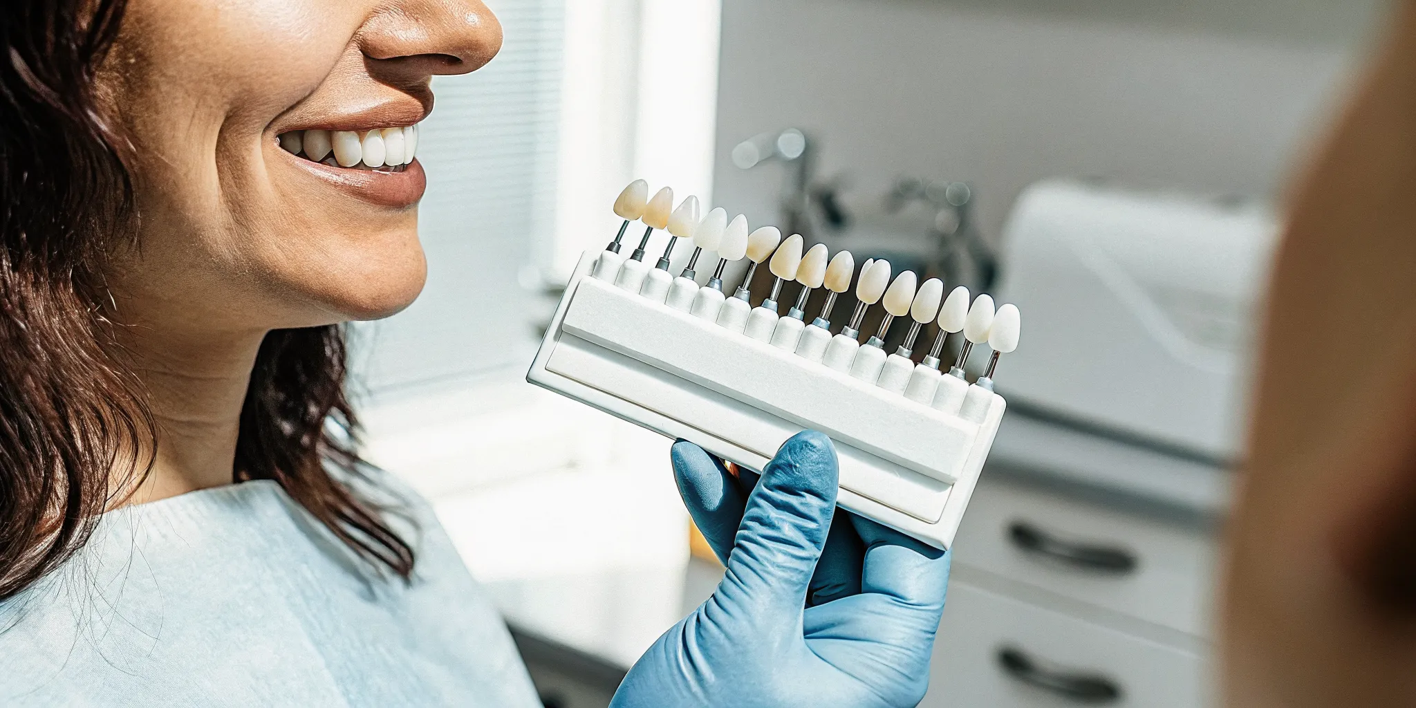 Dental veneers being examined closely as part of planning long-lasting cosmetic treatment