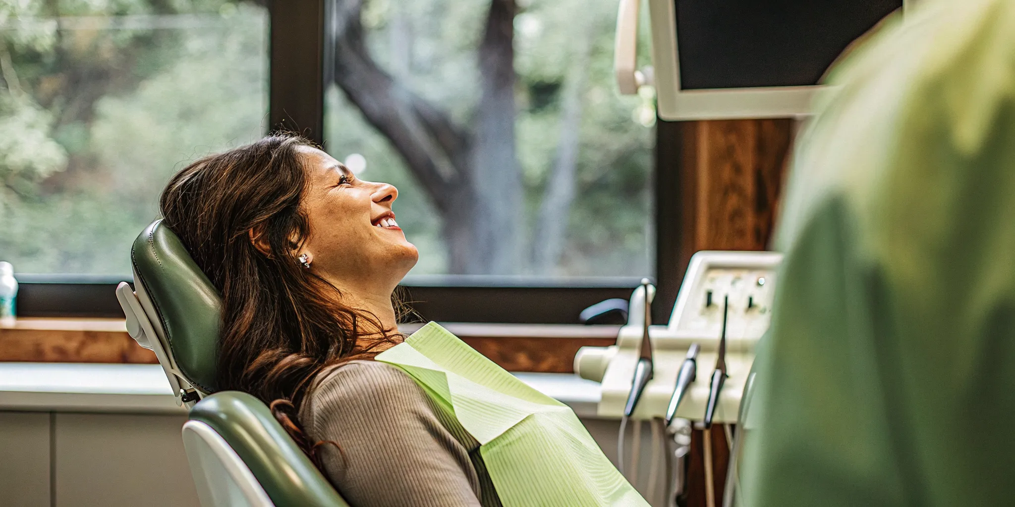 Happy patient smiling after successful dental implant treatment