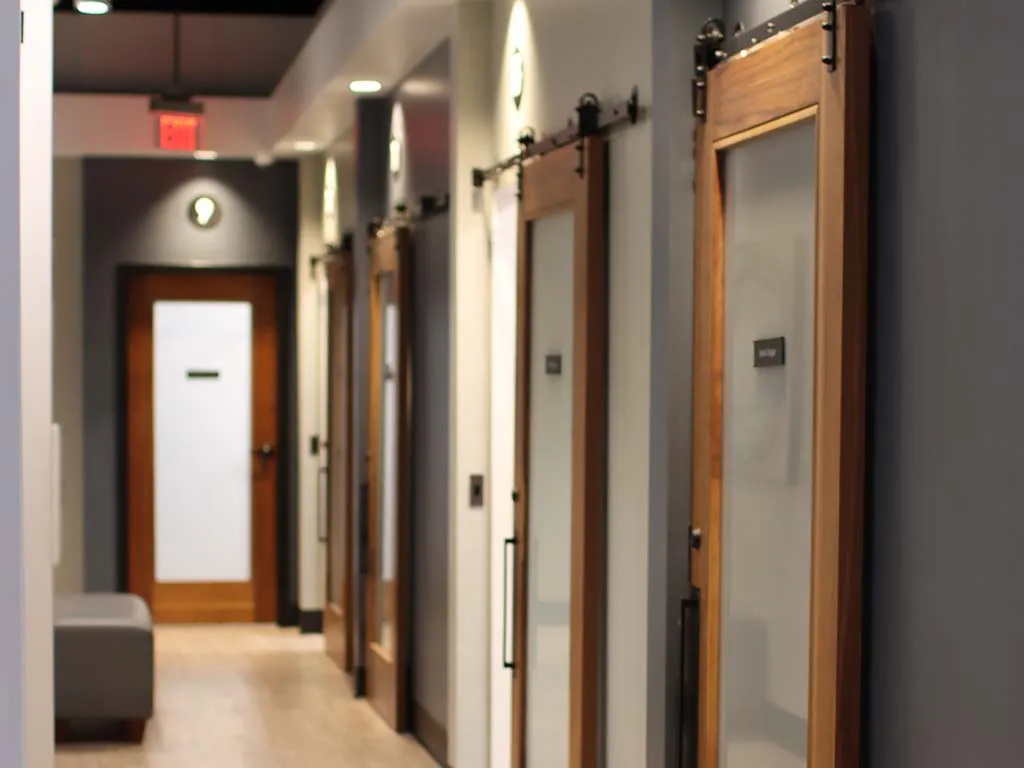 Modern Salons by JC franchise location exterior featuring professional storefront design