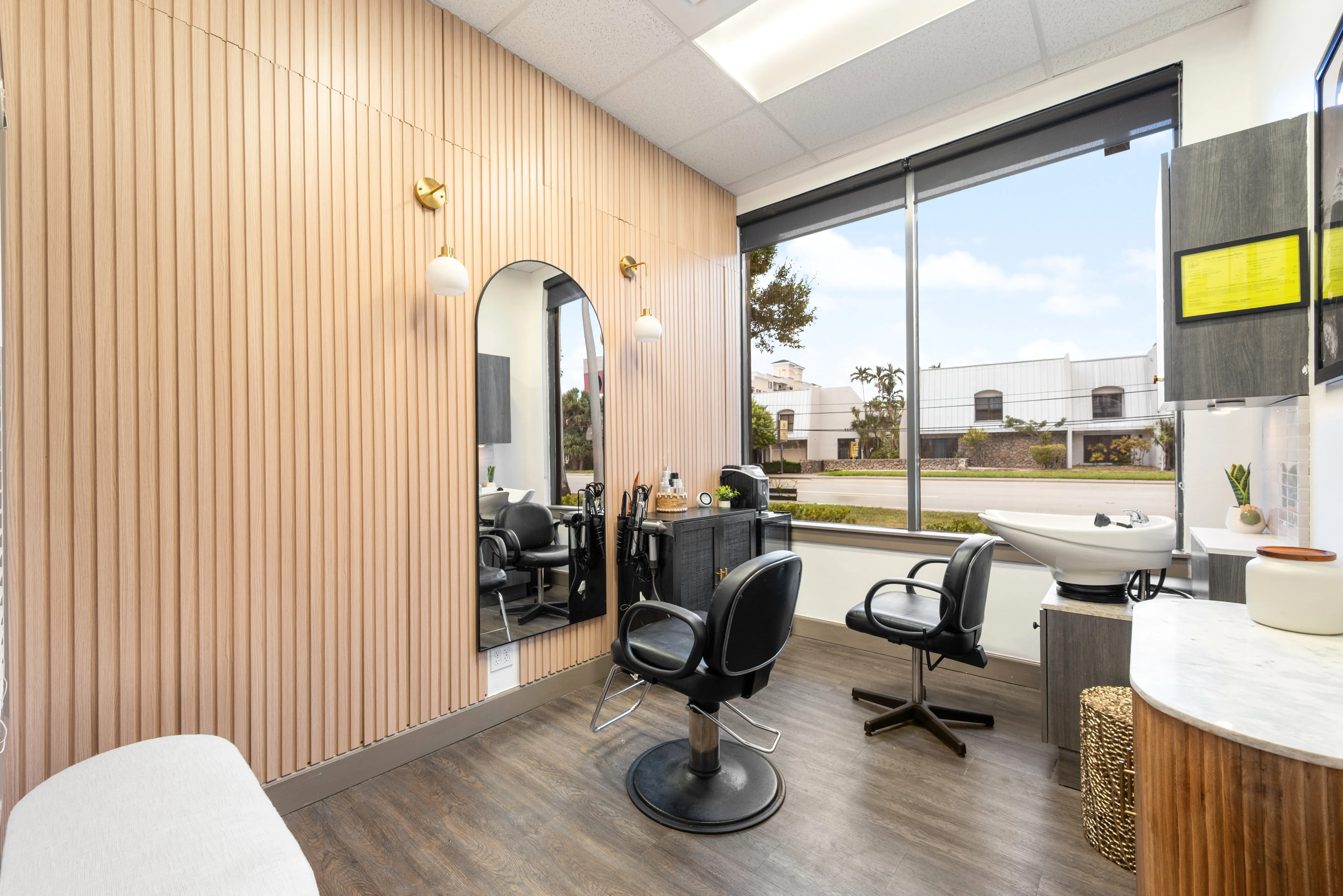 Well-appointed salon suite interior showcasing a premium franchise investment environment at Salons by JC